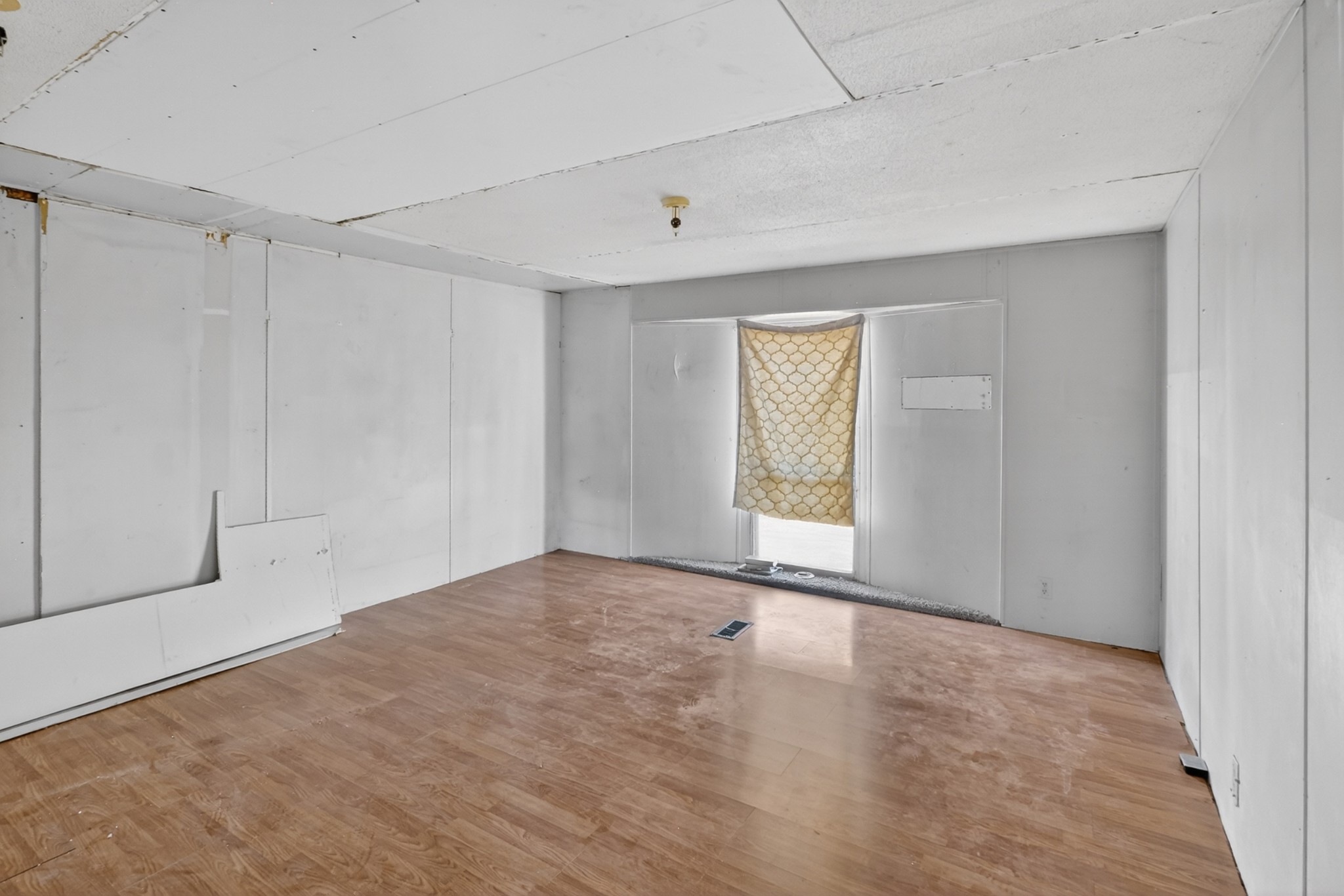 285 George Akins Road Westmoreland, TN 37186 - Photo 14 of 26 a view of an empty room with a window