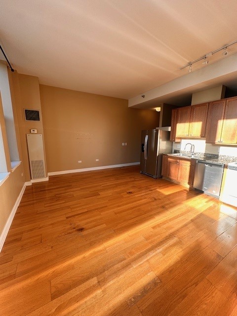 8 West Monroe Street, Unit 1206 Chicago, IL 60603 - Photo 5 of 12 a view of a livingroom with a fireplace