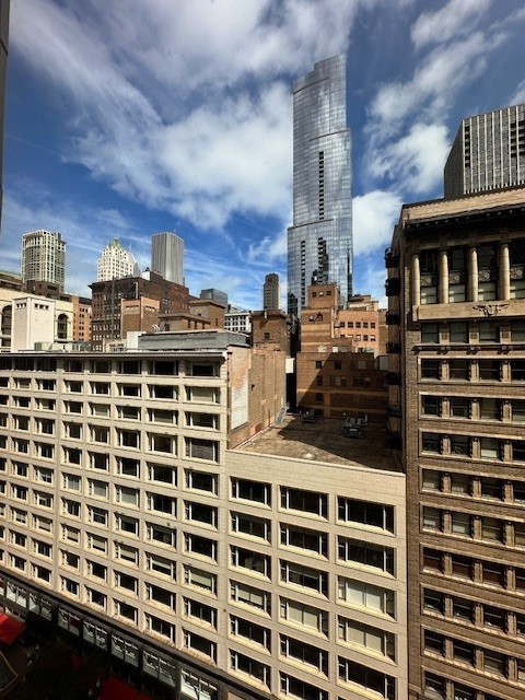 8 West Monroe Street, Unit 1206 Chicago, IL 60603 - Photo 8 of 12 a view of a building with a street