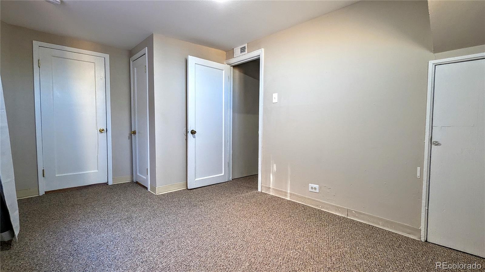 3349 Adams Street Denver, CO 80205 - Photo 18 of 31 a view of an empty room