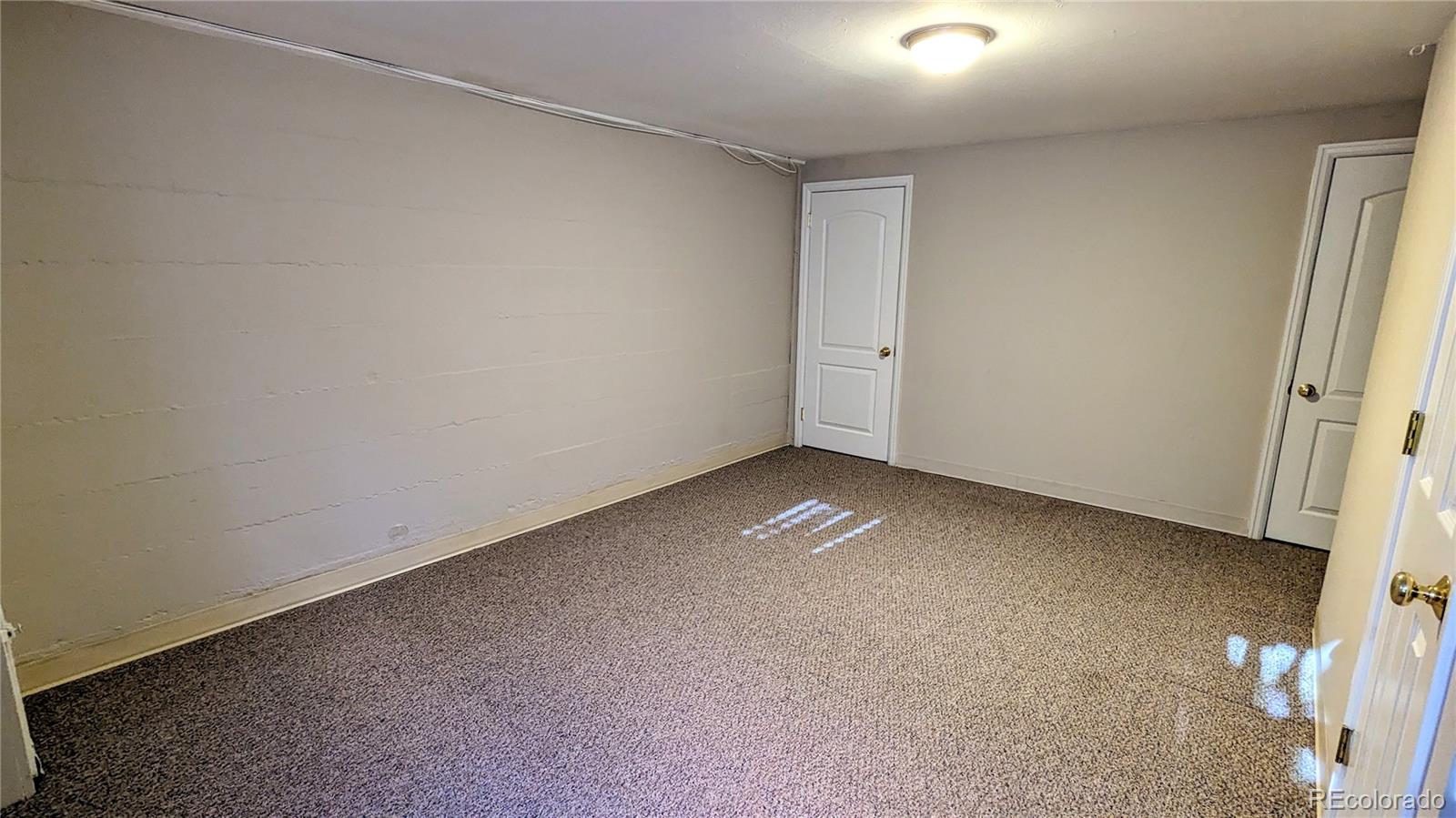 3349 Adams Street Denver, CO 80205 - Photo 21 of 31 an empty room with a empty space