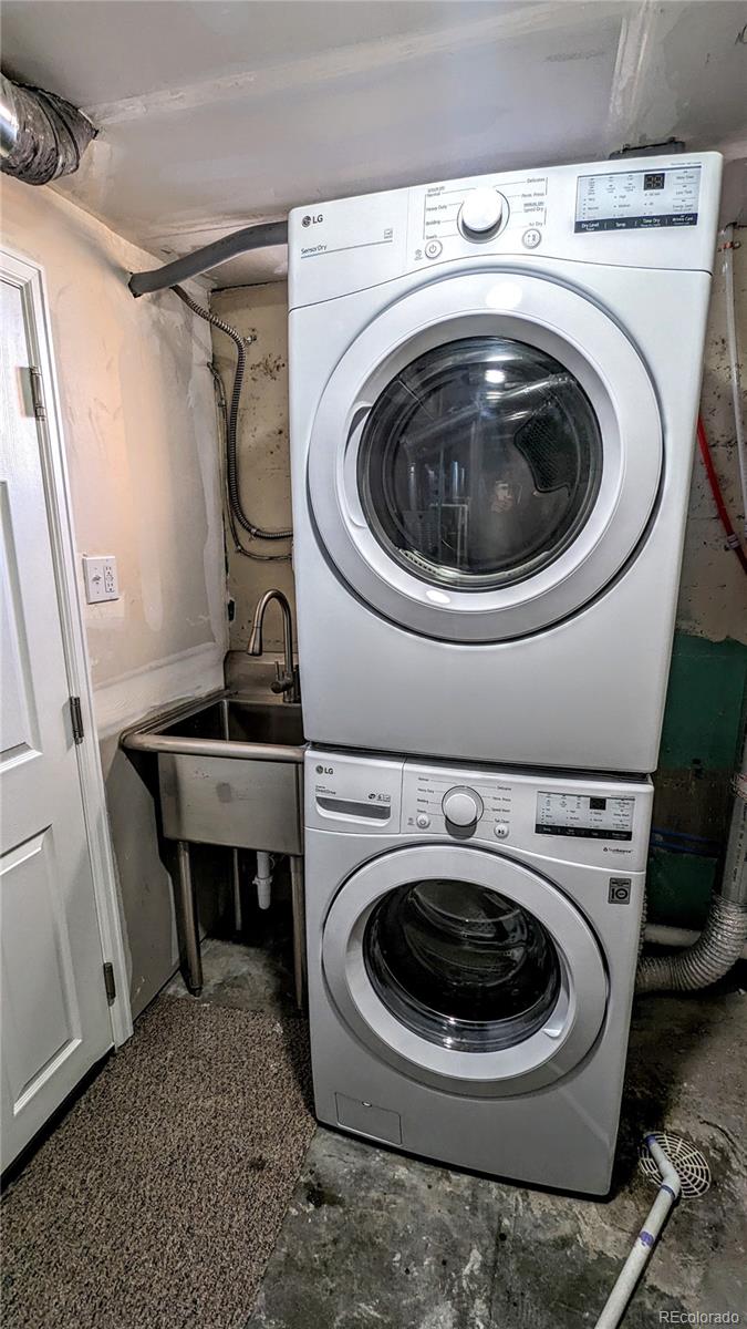 3349 Adams Street Denver, CO 80205 - Photo 24 of 31 a utility room with dryer and washer