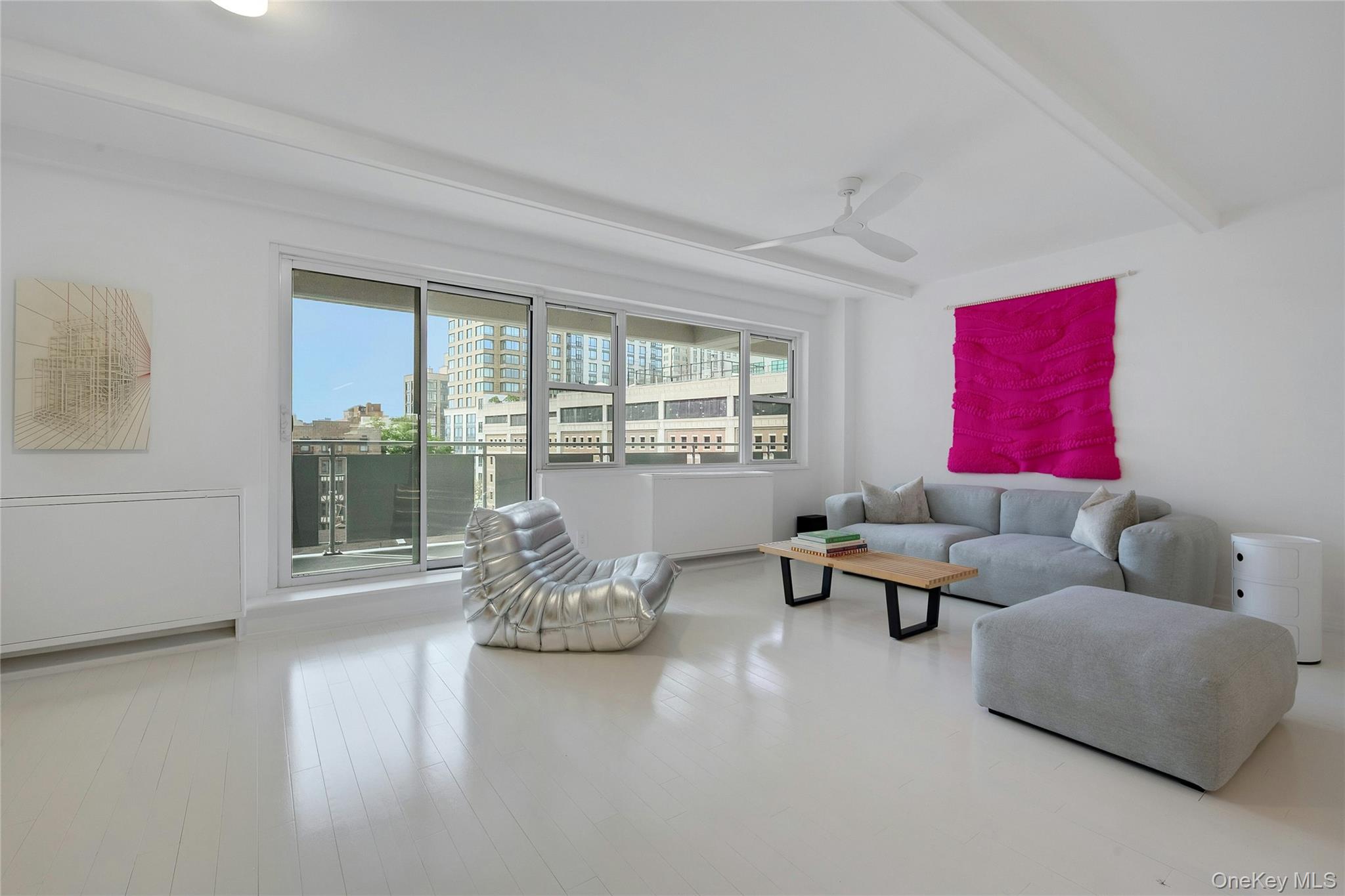 300 Martine Avenue, Unit 7B White Plains, NY 10601 - Photo 18 of 29 a living room with furniture and a large window