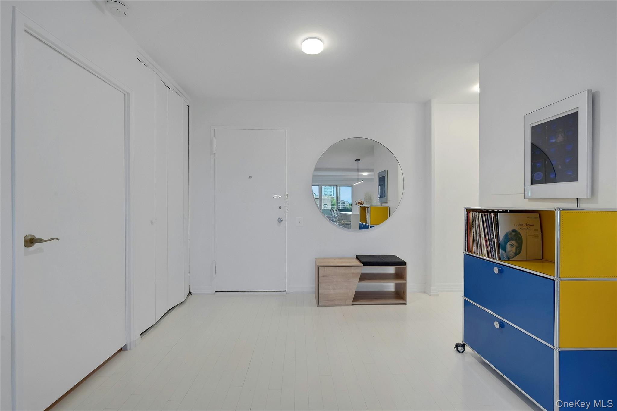 300 Martine Avenue, Unit 7B White Plains, NY 10601 - Photo 2 of 29 a bedroom with a bed and a dresser in it