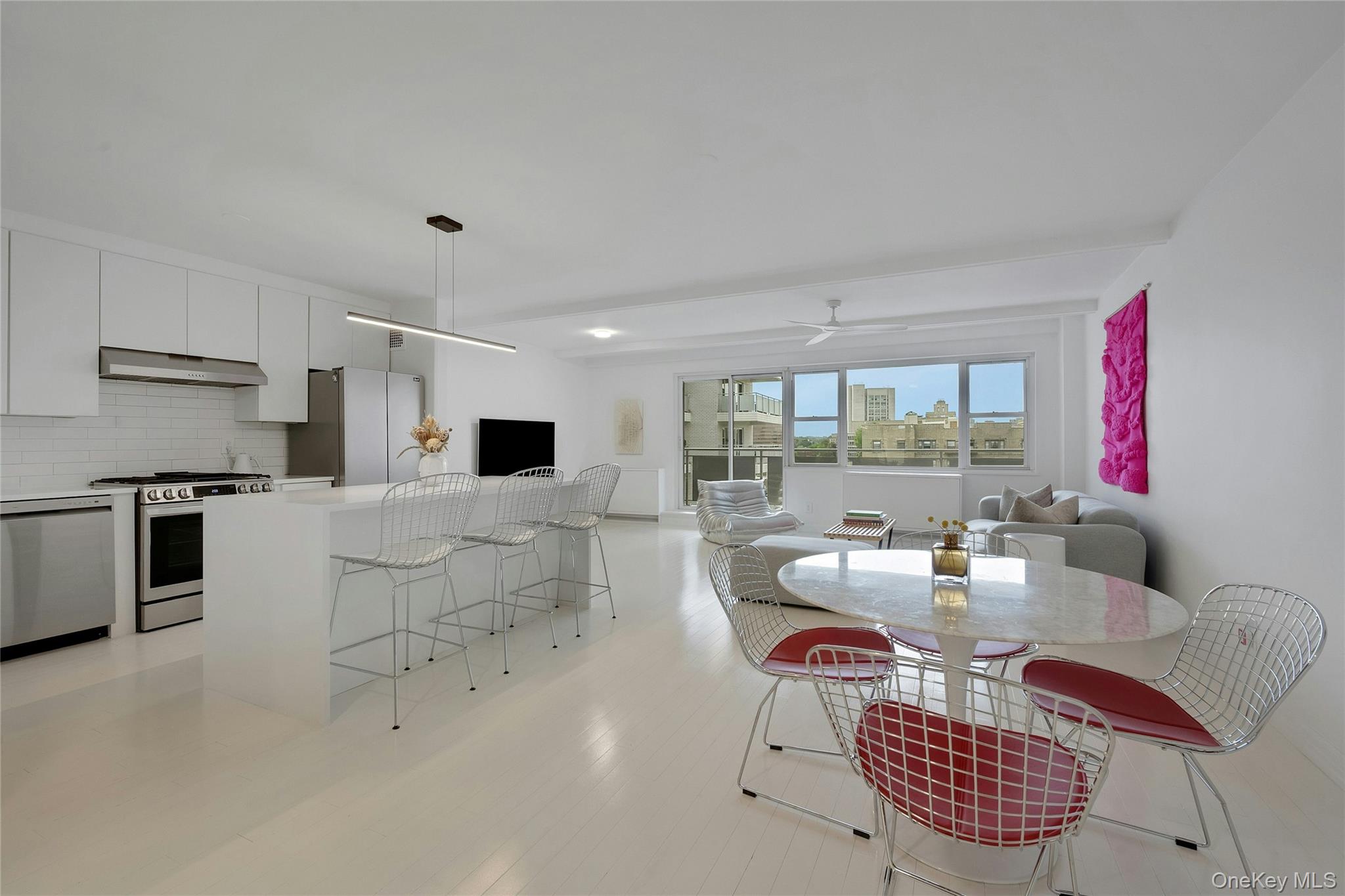 300 Martine Avenue, Unit 7B White Plains, NY 10601 - Photo 7 of 29 a living room with furniture and a fireplace