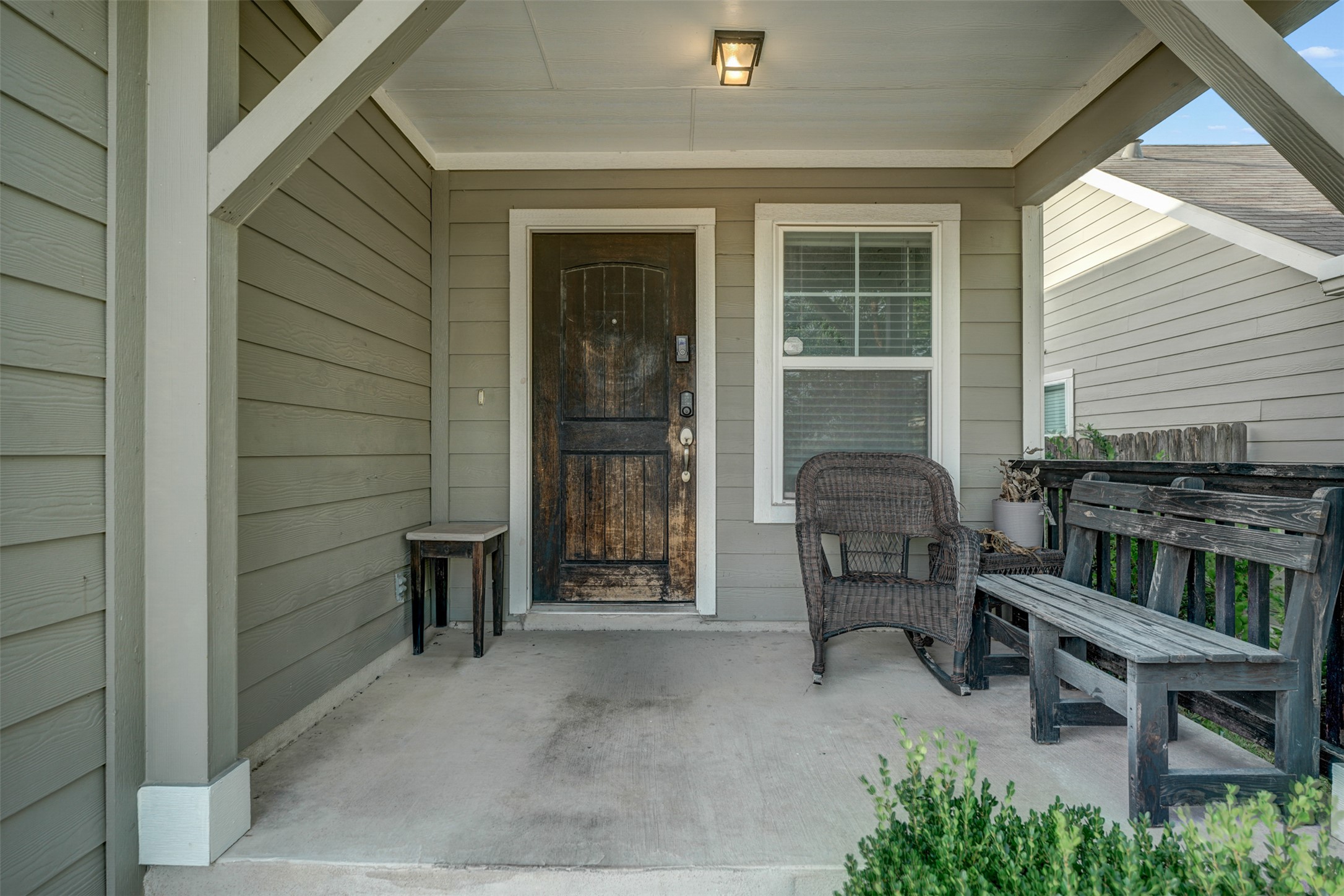 5806 Aviano Road Round Rock, TX 78665 - Photo 3 of 29 A welcoming front porch features sturdy columns and durable siding, creating inviting curb appeal.