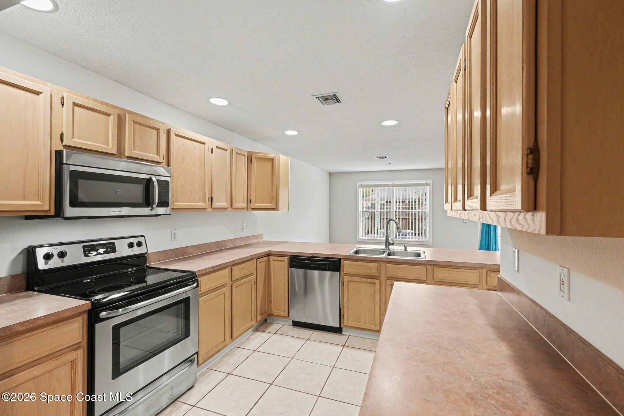 499 Arbor Ridge Lane Titusville, FL 32780 - Photo 13 of 28 013_file_2274