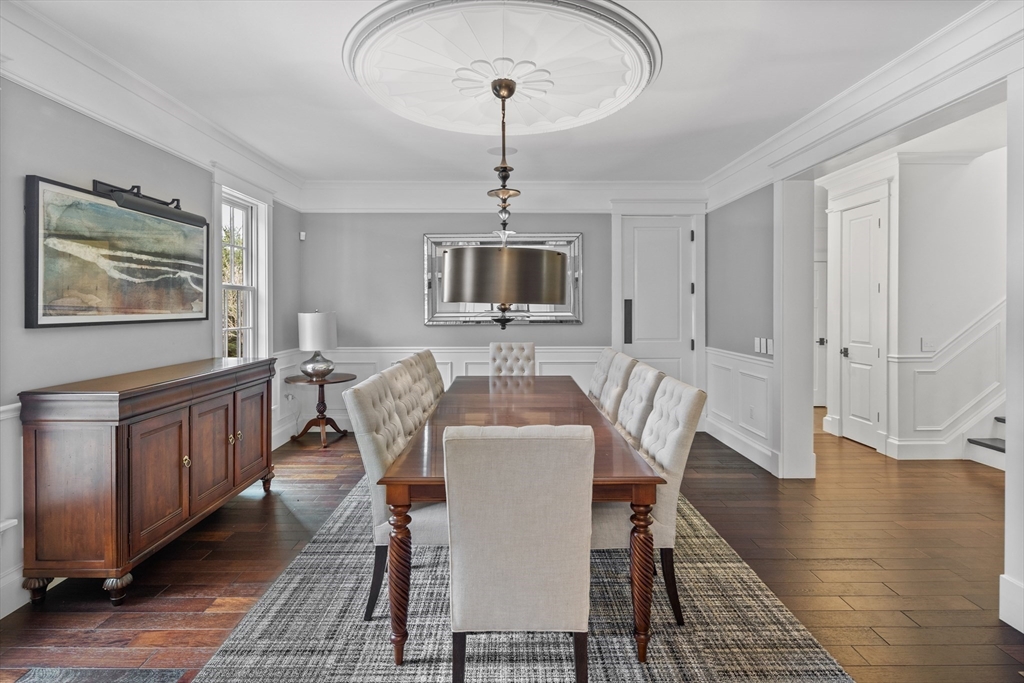 75 A Goddard Avenue Brookline, MA 02445 - Photo 16 of 27 a view of a dining room with furniture window and wooden floor