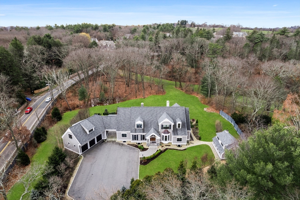 75 A Goddard Avenue Brookline, MA 02445 - Photo 25 of 27 an aerial view of a house with a garden and lake view