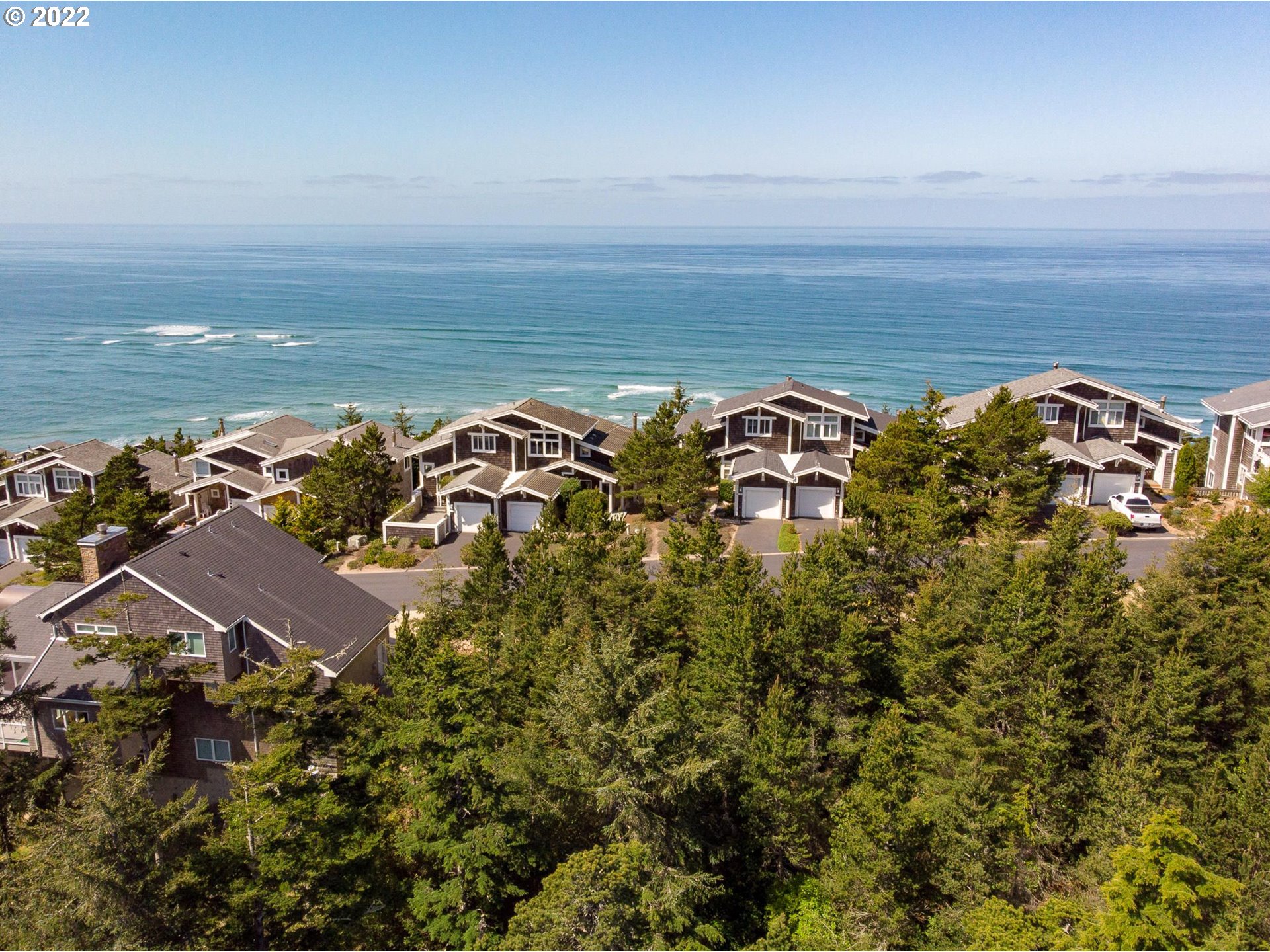 Promontory Lane Tillamook, OR 97141 - Photo 8 of 11 a view of an ocean with a building in the background