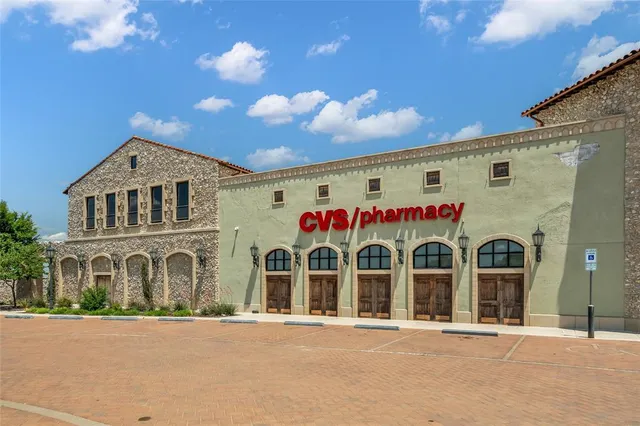 a view of a street with cars