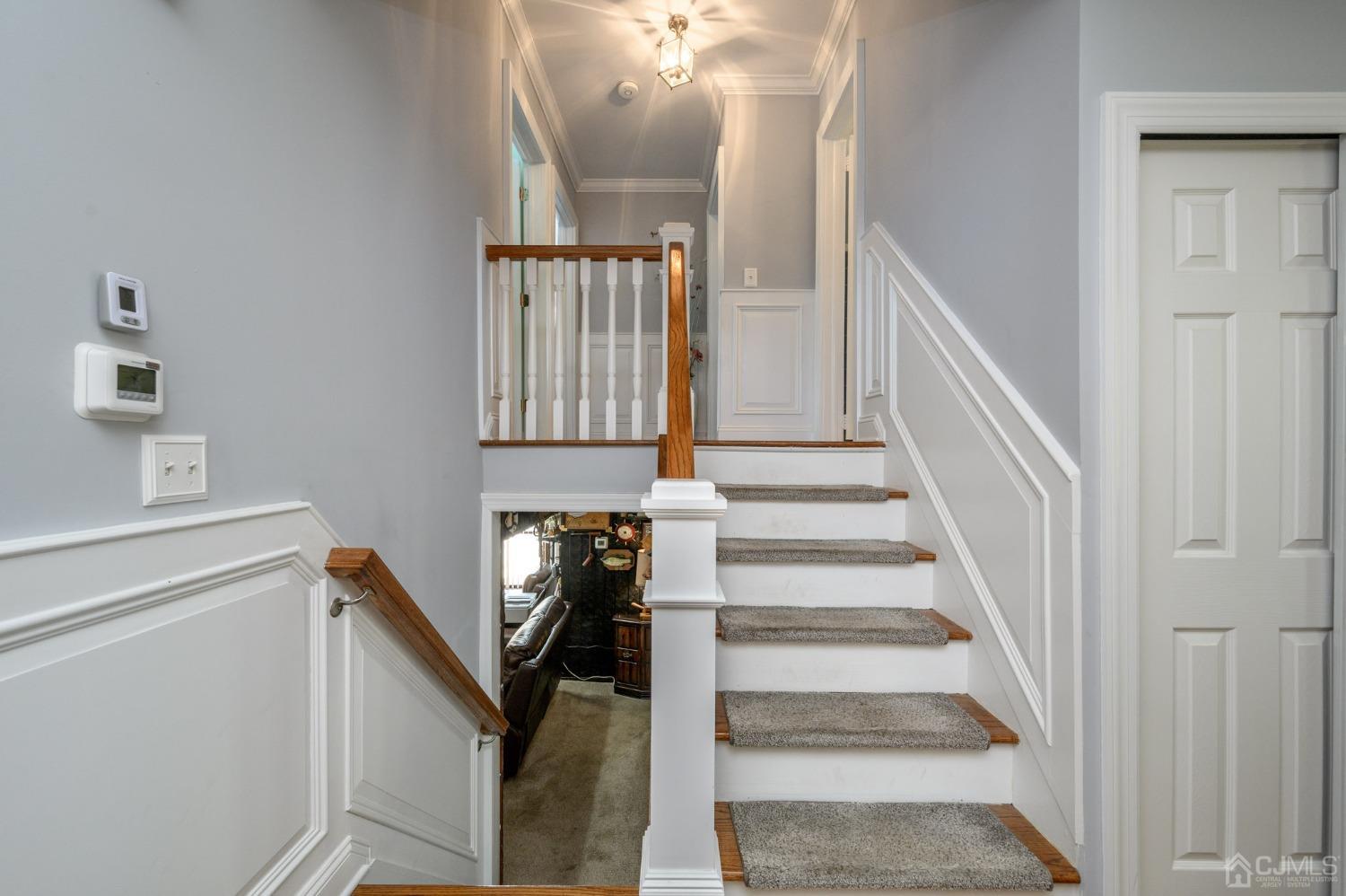 54 Manito Road Manasquan, NJ 08736 - Photo 17 of 47 a view of entryway and hall with wooden floor