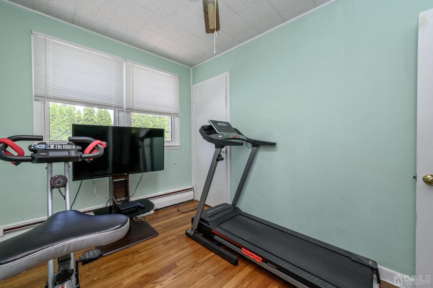 54 Manito Road Manasquan, NJ 08736 - Photo 23 of 47 a room with gym equipment