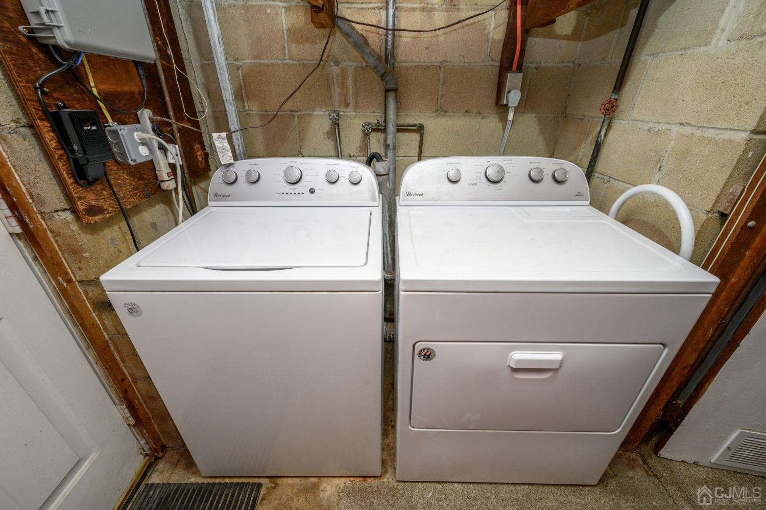 54 Manito Road Manasquan, NJ 08736 - Photo 29 of 47 a utility room with dryer and washer