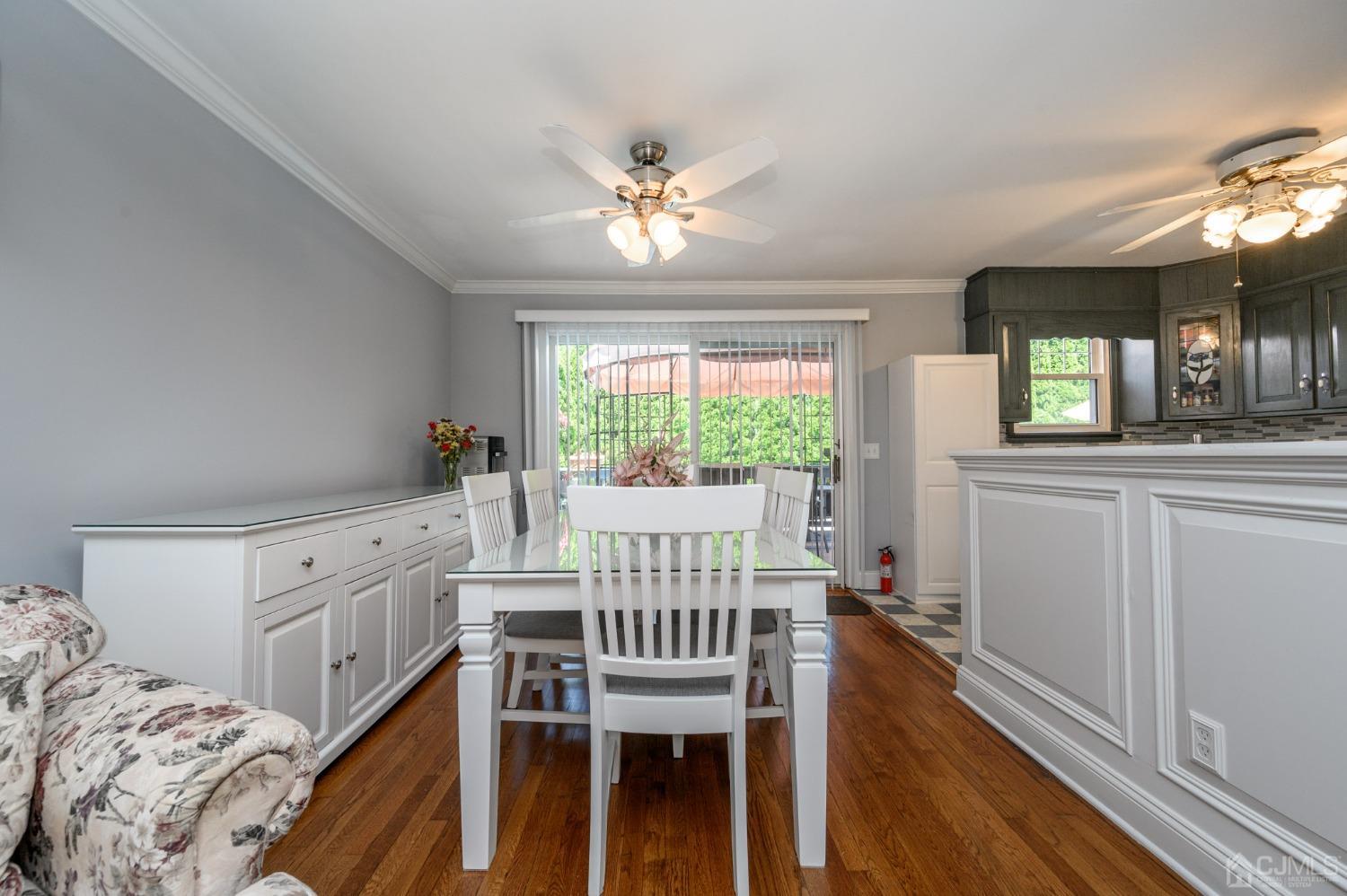 54 Manito Road Manasquan, NJ 08736 - Photo 8 of 47 a view of a dining room with furniture window and wooden floor