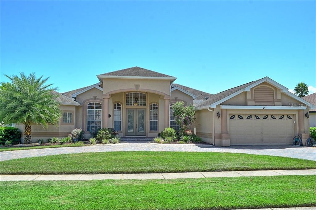 1413 Canal Point Road Longwood, FL 32750 - Photo 1 of 1 Front Exterior with paver circular driveway