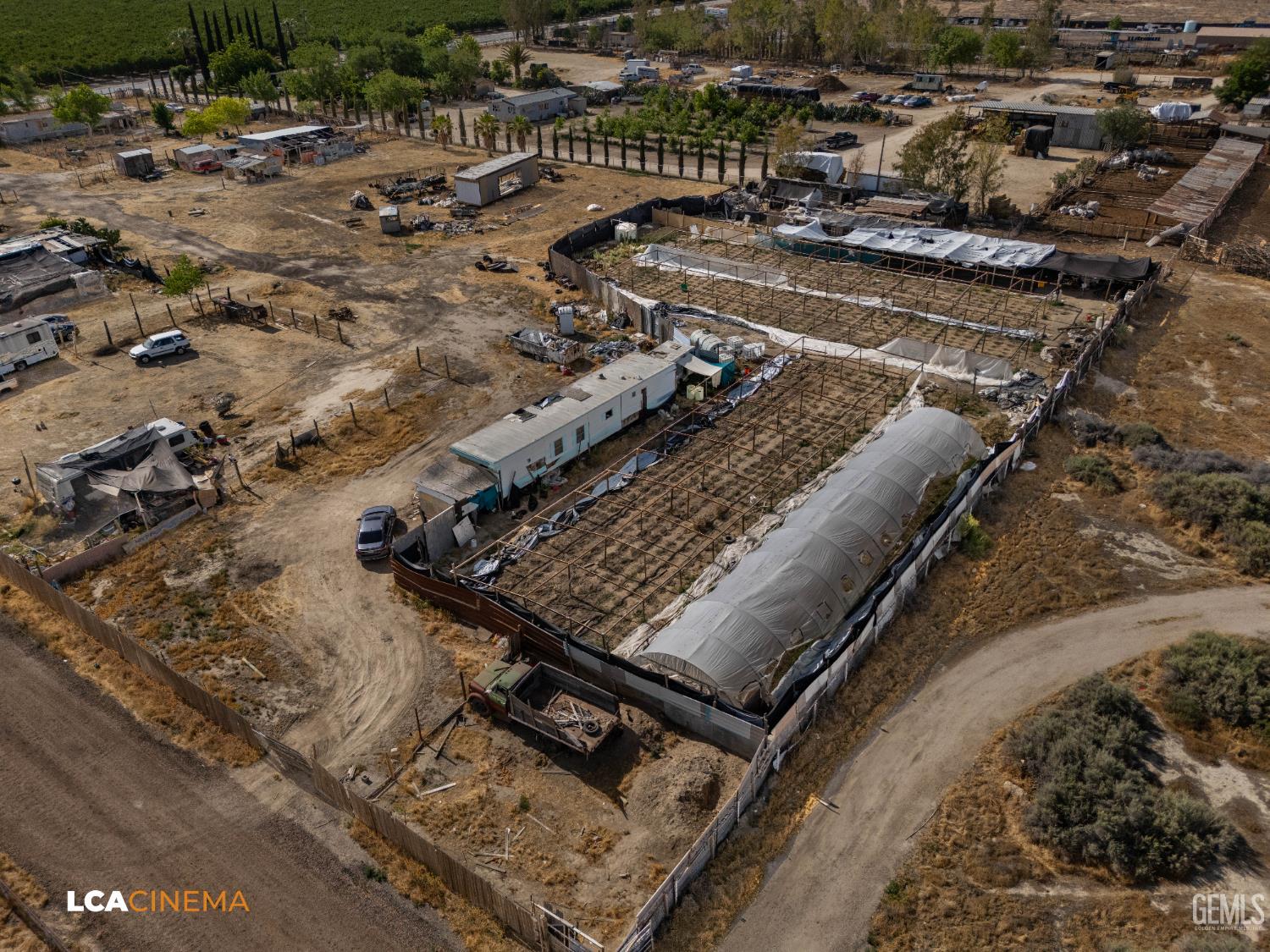 Undisclosed Address Wasco, CA 93280 - Photo 11 of 42 a view of a backyard