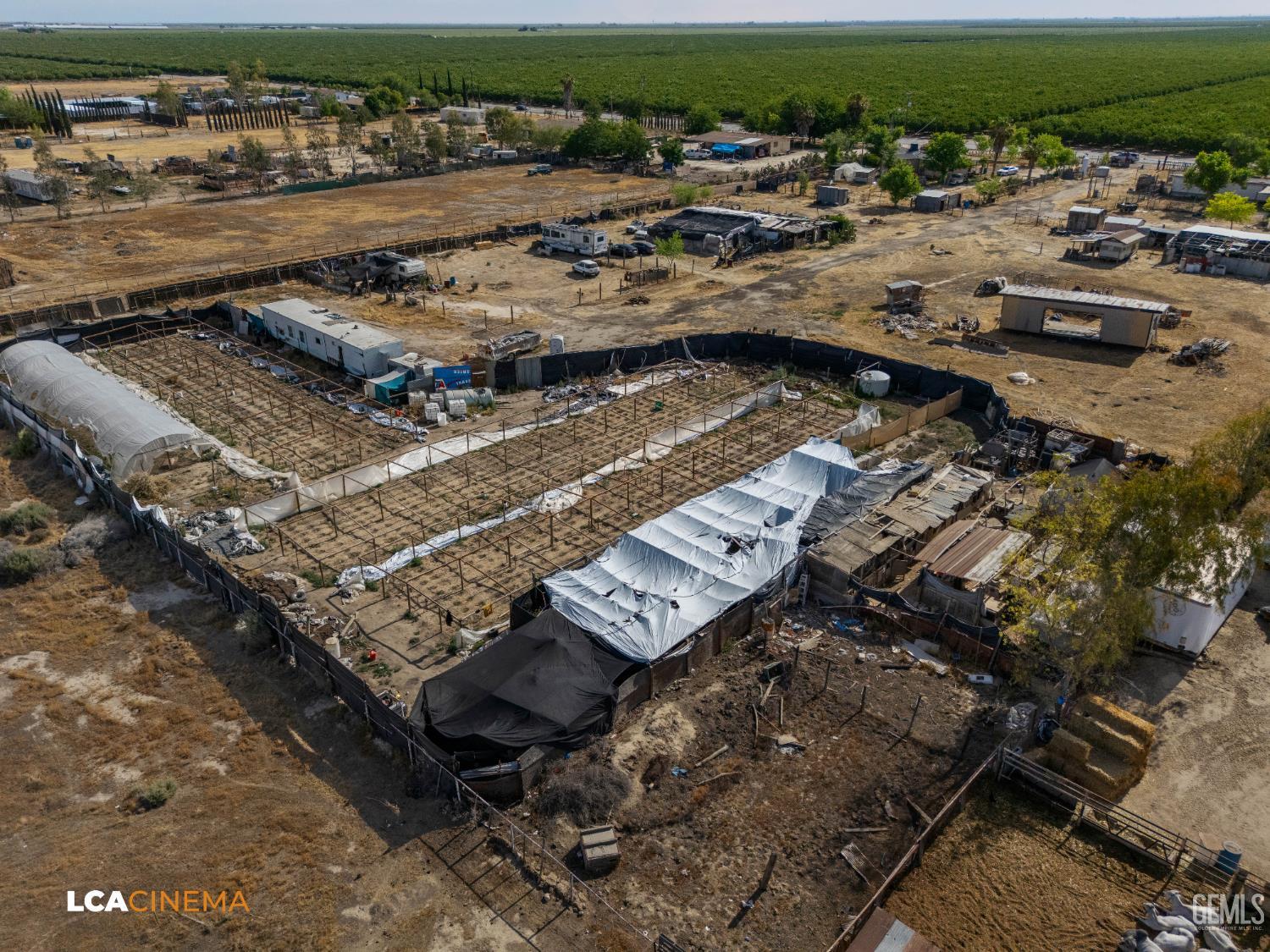 Undisclosed Address Wasco, CA 93280 - Photo 14 of 42 an aerial view of a residential houses with outdoor space