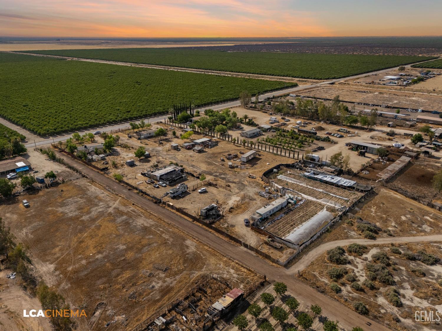 Undisclosed Address Wasco, CA 93280 - Photo 16 of 42 an aerial view of a pool