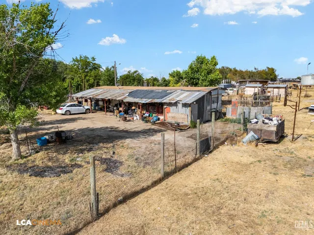 a view of a backyard of a house