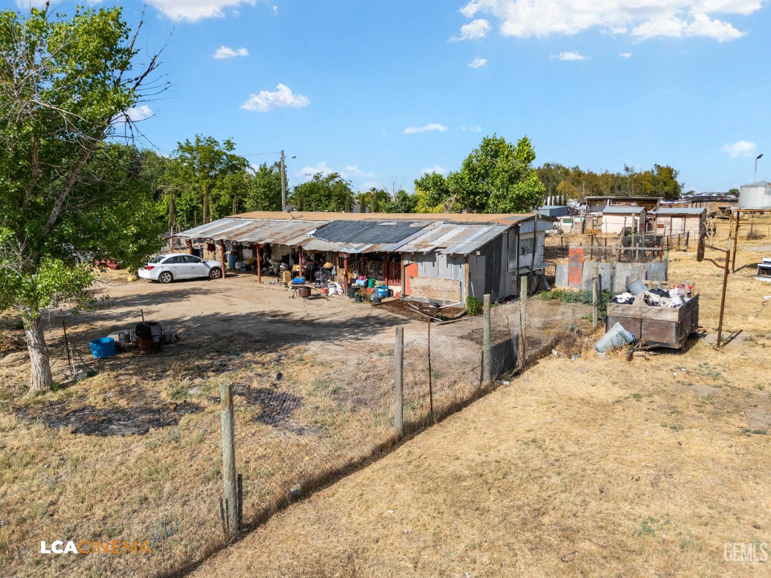 Undisclosed Address Wasco, CA 93280 - Photo 30 of 42 a view of a patio with swimming pool