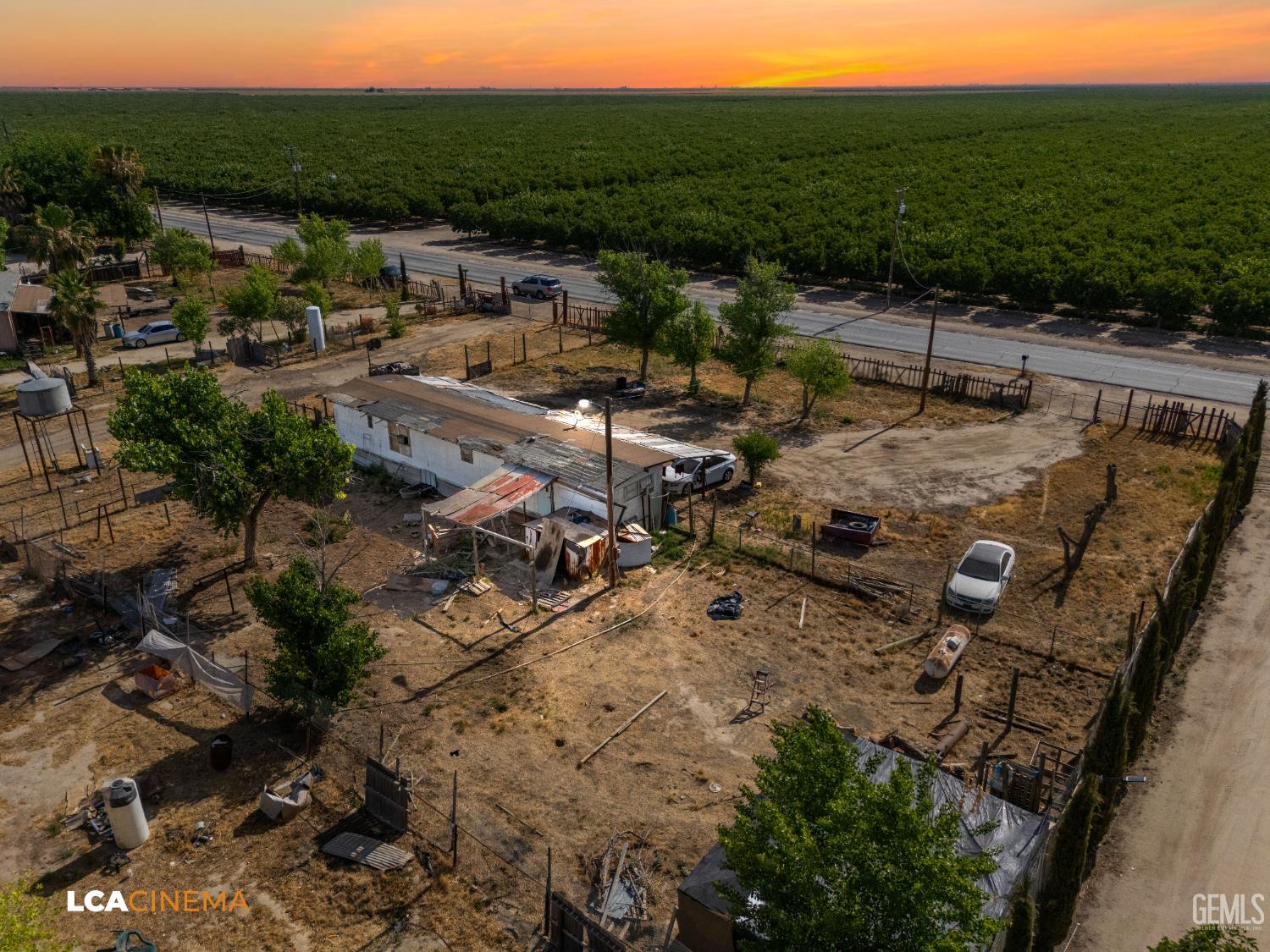 Undisclosed Address Wasco, CA 93280 - Photo 3 of 42 an aerial view of a house with outdoor space