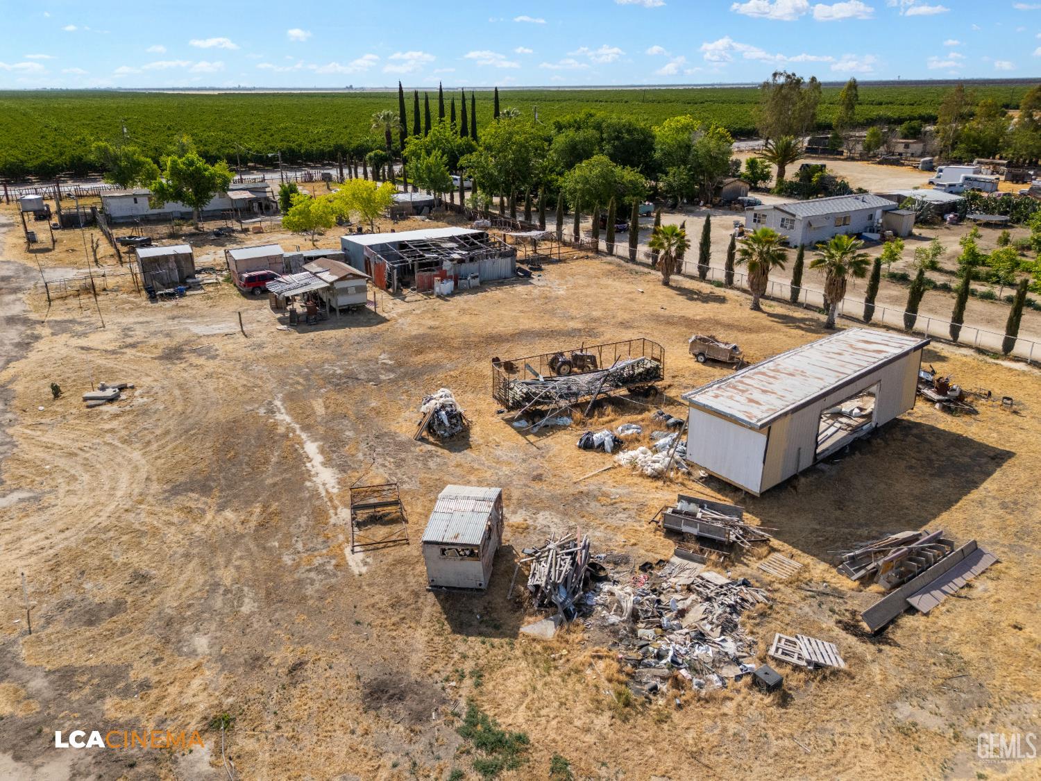 Undisclosed Address Wasco, CA 93280 - Photo 32 of 42 a view of a terrace with lawn chairs