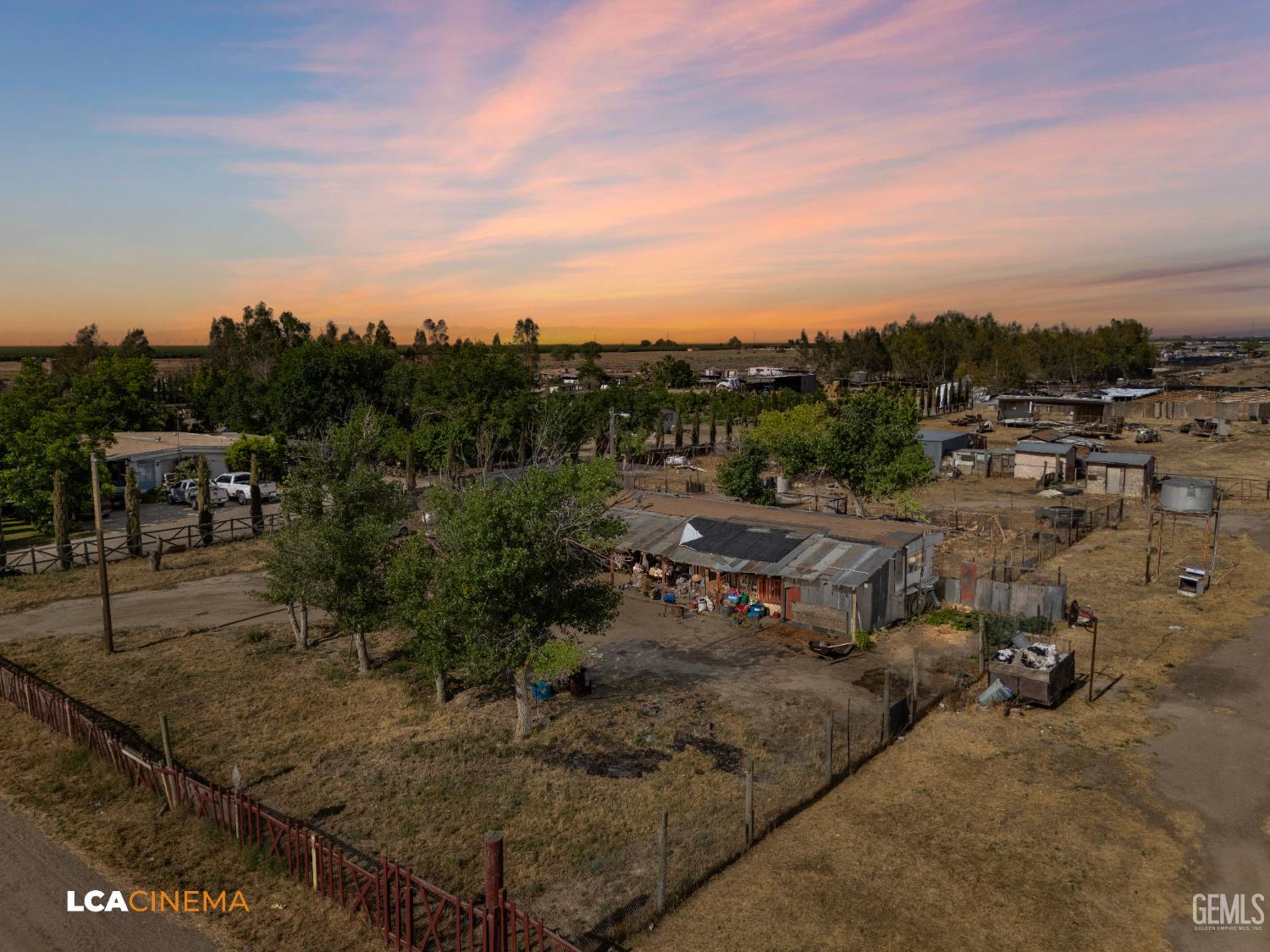 Undisclosed Address Wasco, CA 93280 - Photo 5 of 42 a view of a dry yard with trees