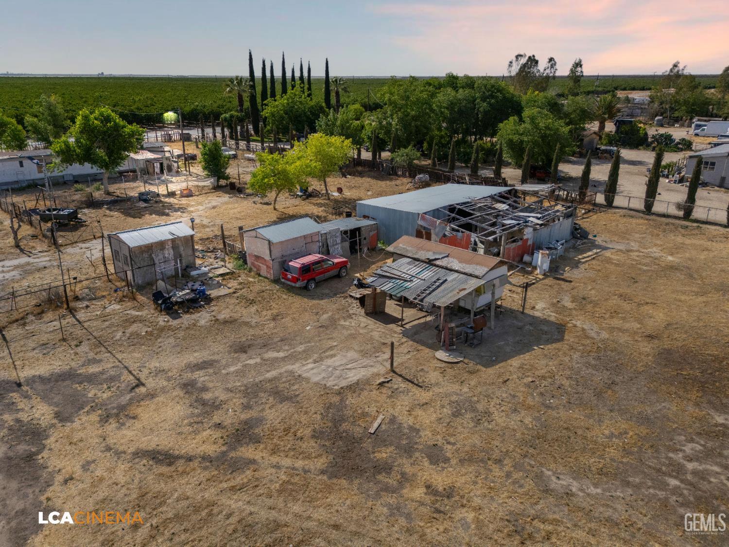 Undisclosed Address Wasco, CA 93280 - Photo 6 of 42 a view of a backyard with sitting area