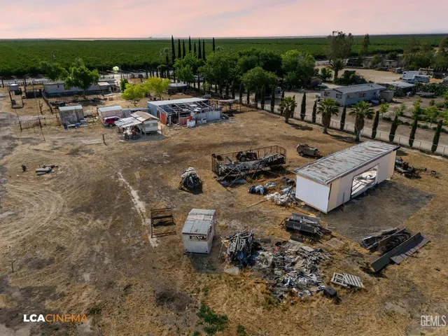 a terrace with outdoor seating and city view