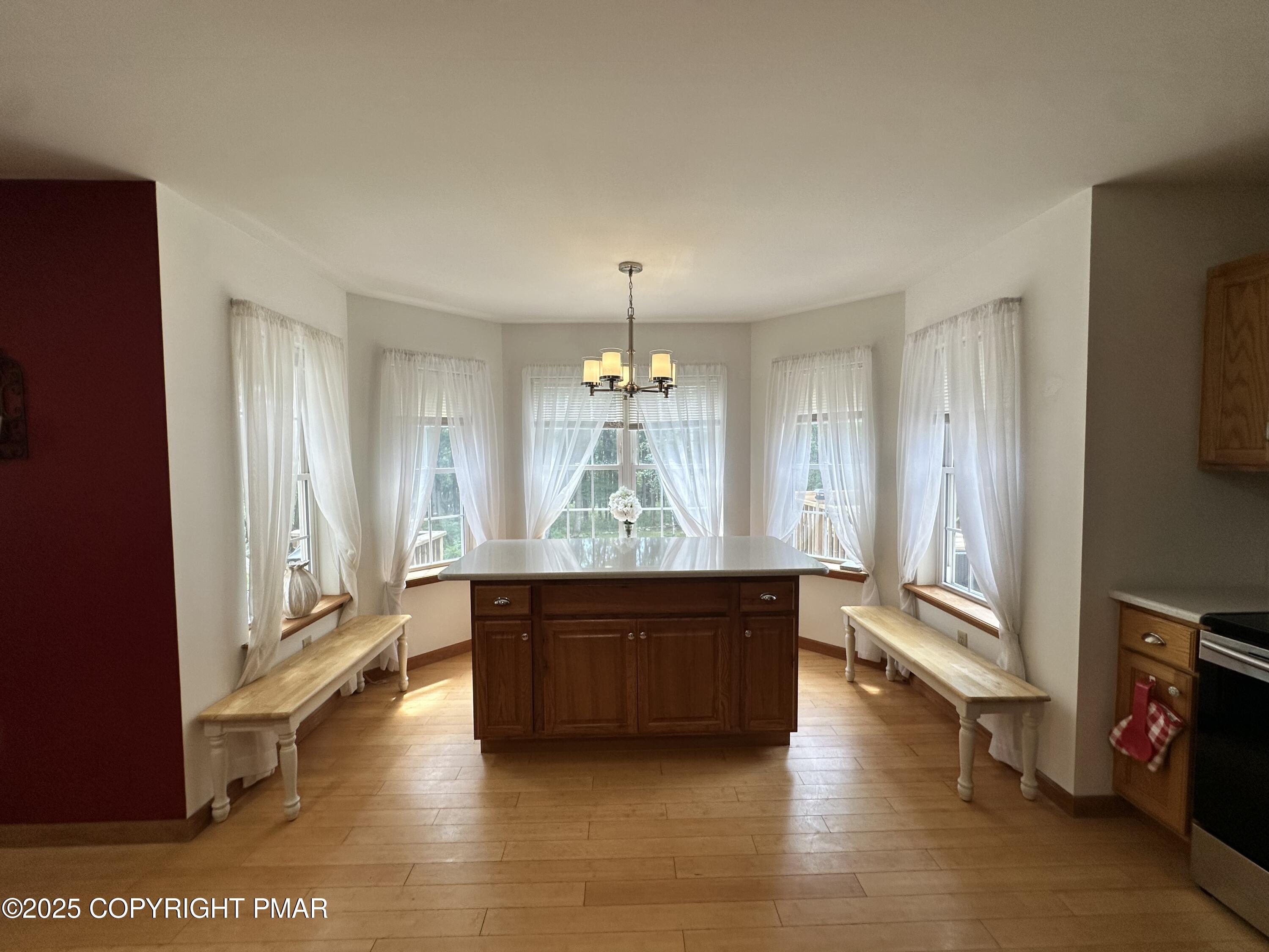 107 Horseshoe Drive Effort, PA 18330 - Photo 27 of 72 a living room with fireplace furniture and a wooden floor