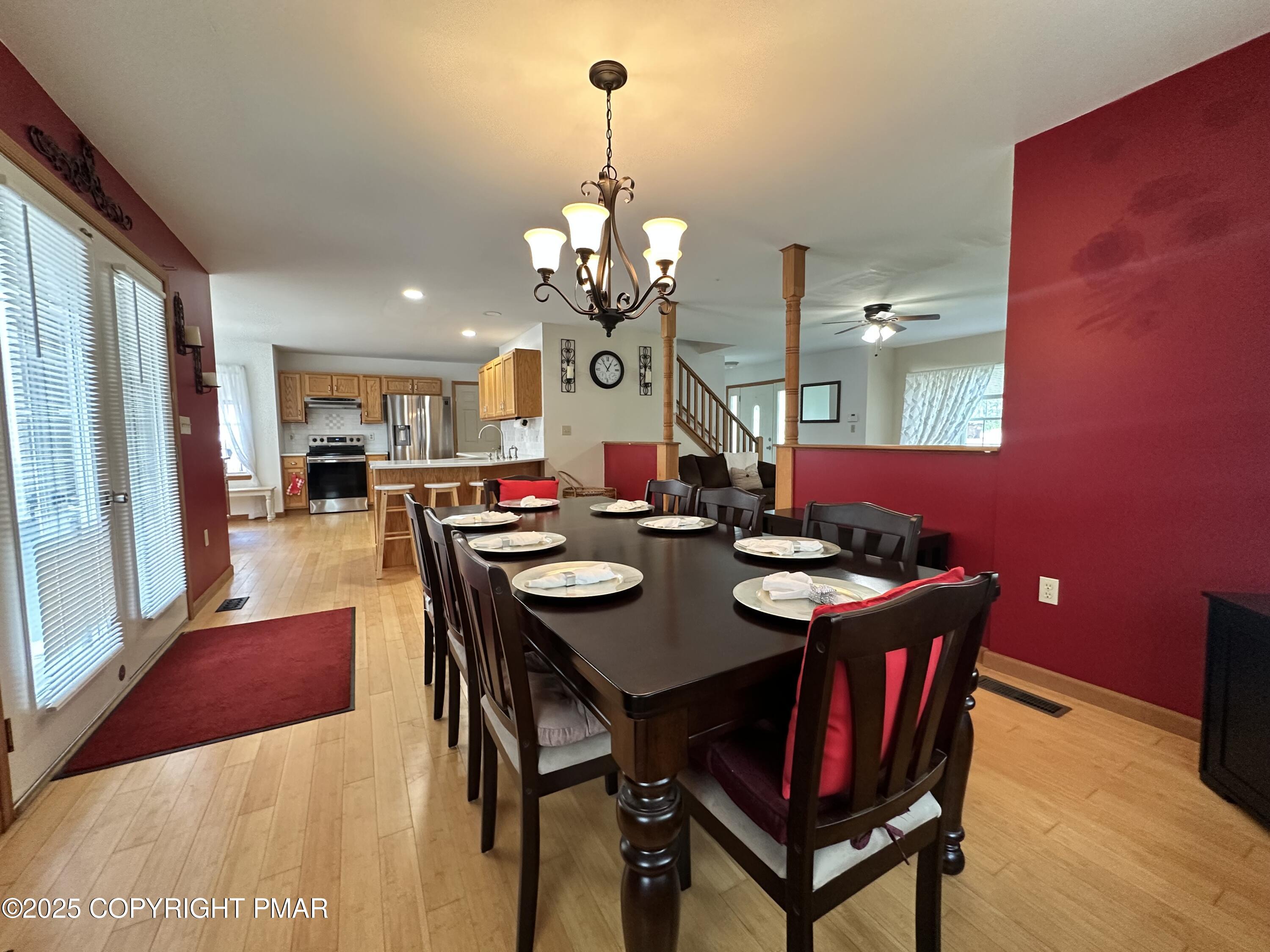 107 Horseshoe Drive Effort, PA 18330 - Photo 3 of 72 a view of a dining room with furniture and a chandelier