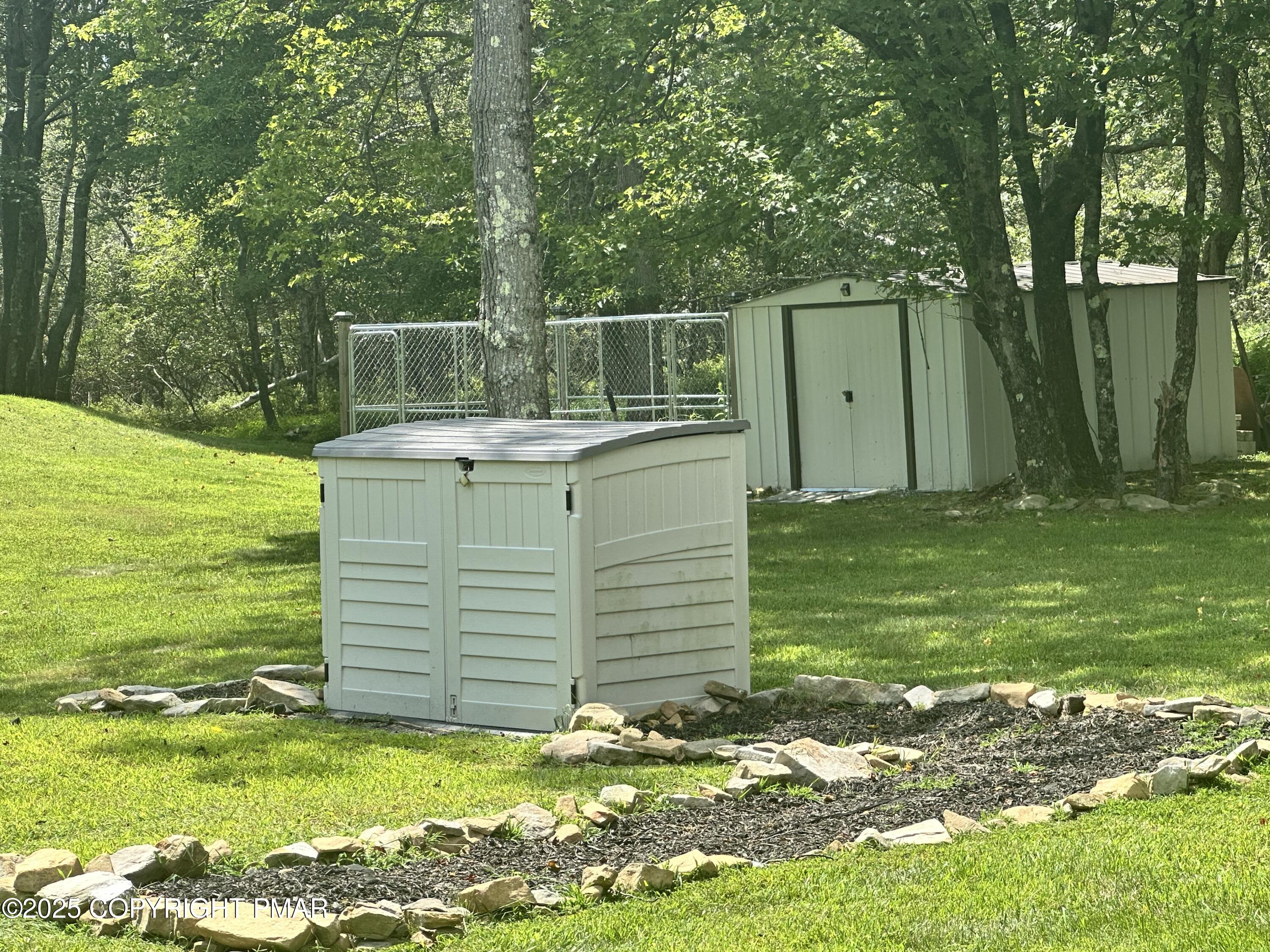 107 Horseshoe Drive Effort, PA 18330 - Photo 72 of 72 a view of a backyard with a garden