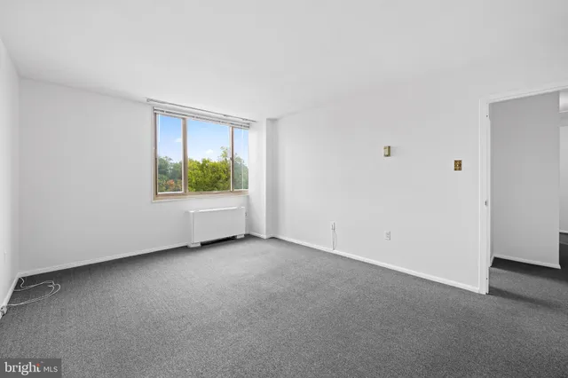 a view of an empty room with window