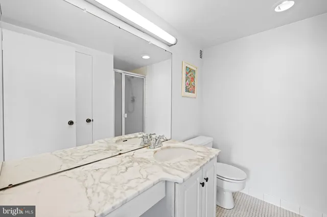 a bathroom with a sink and a toilet