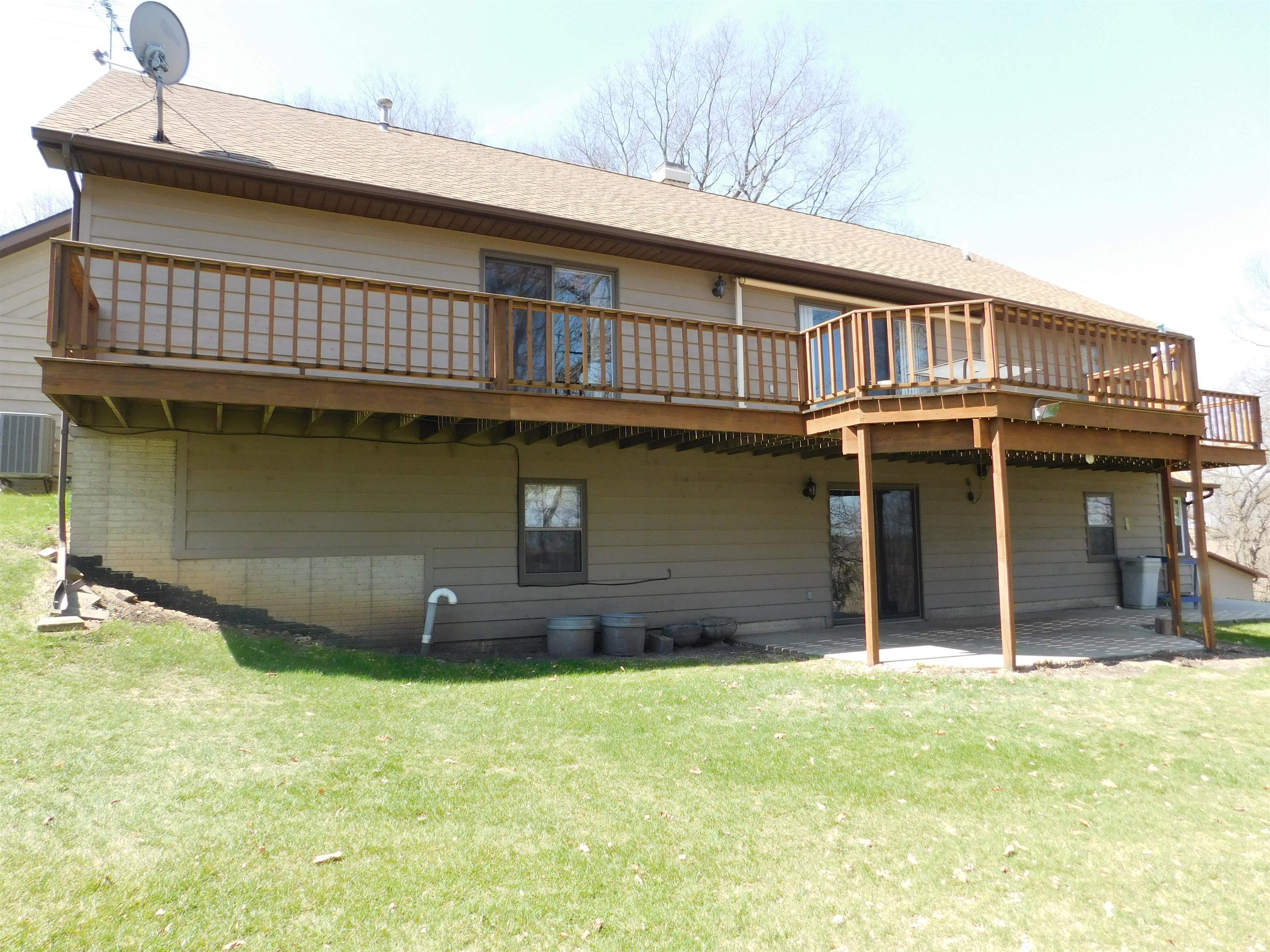 4103 North AYP Road Lena, IL 61048 - Photo 11 of 96 a front view of a house with a garden
