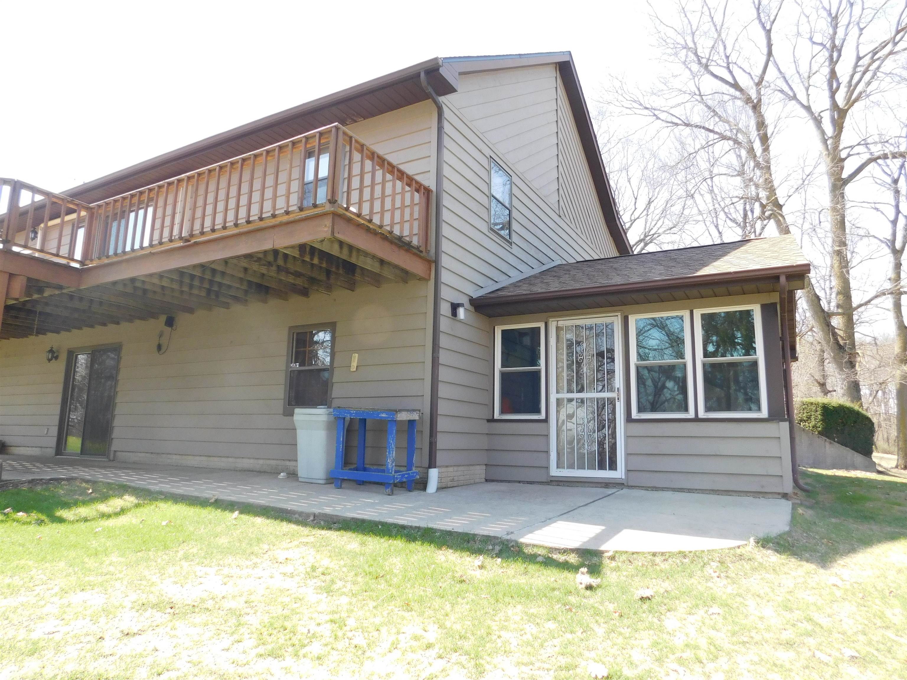 4103 North AYP Road Lena, IL 61048 - Photo 13 of 96 a view of a house with a swimming pool