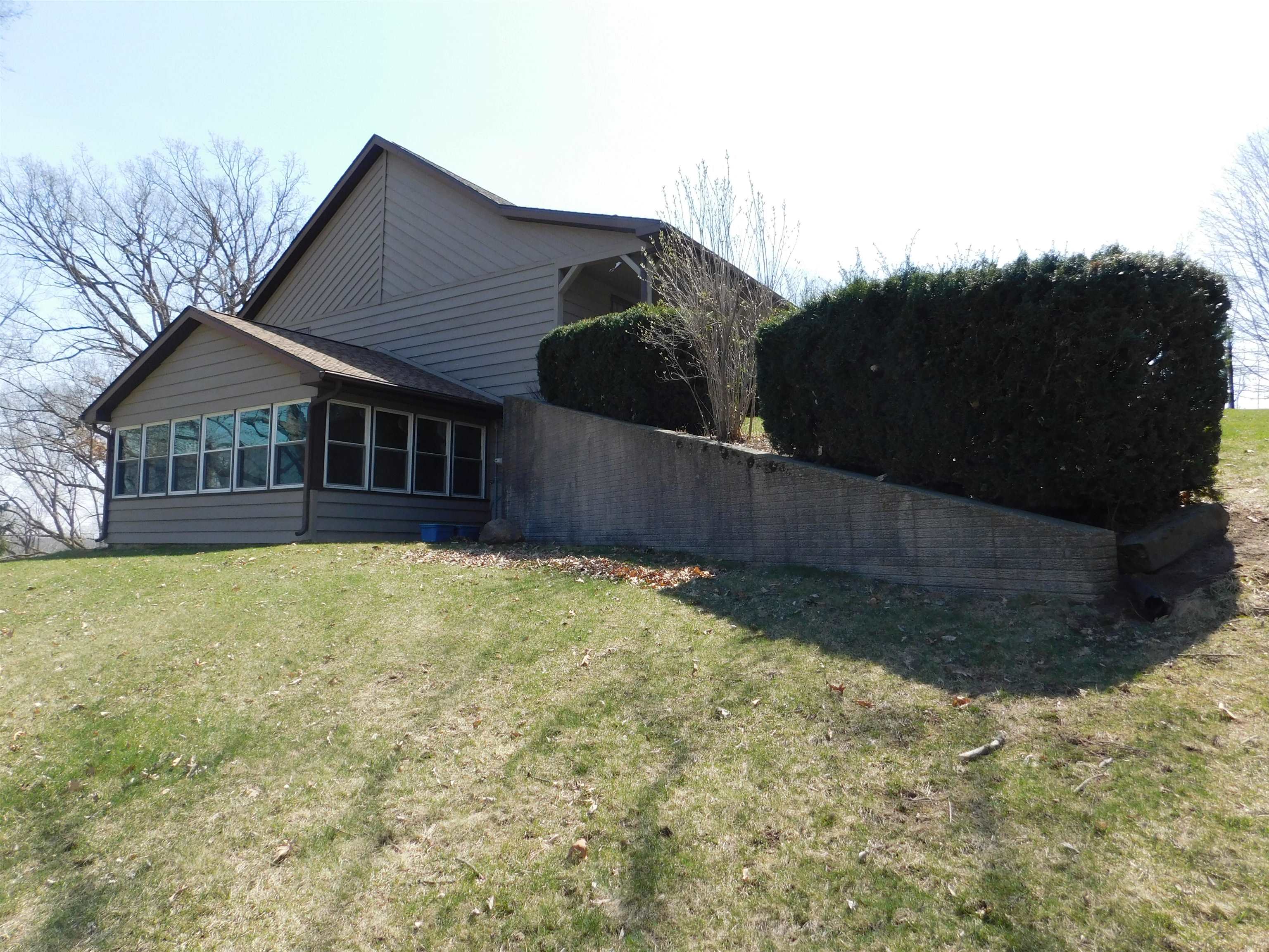 4103 North AYP Road Lena, IL 61048 - Photo 15 of 96 a front view of a house with a yard