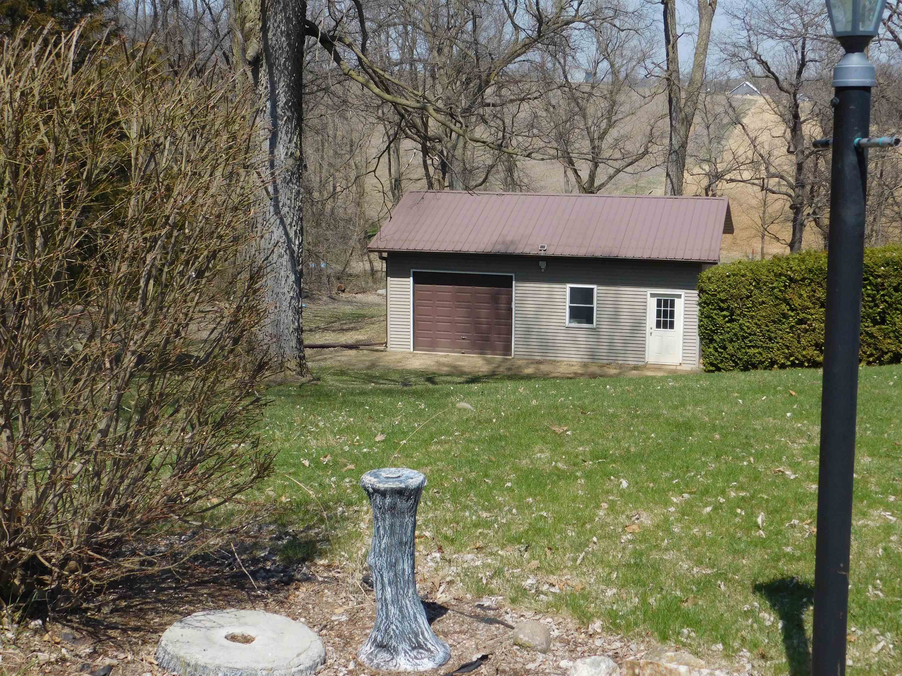 4103 North AYP Road Lena, IL 61048 - Photo 17 of 96 a house view with a backyard space
