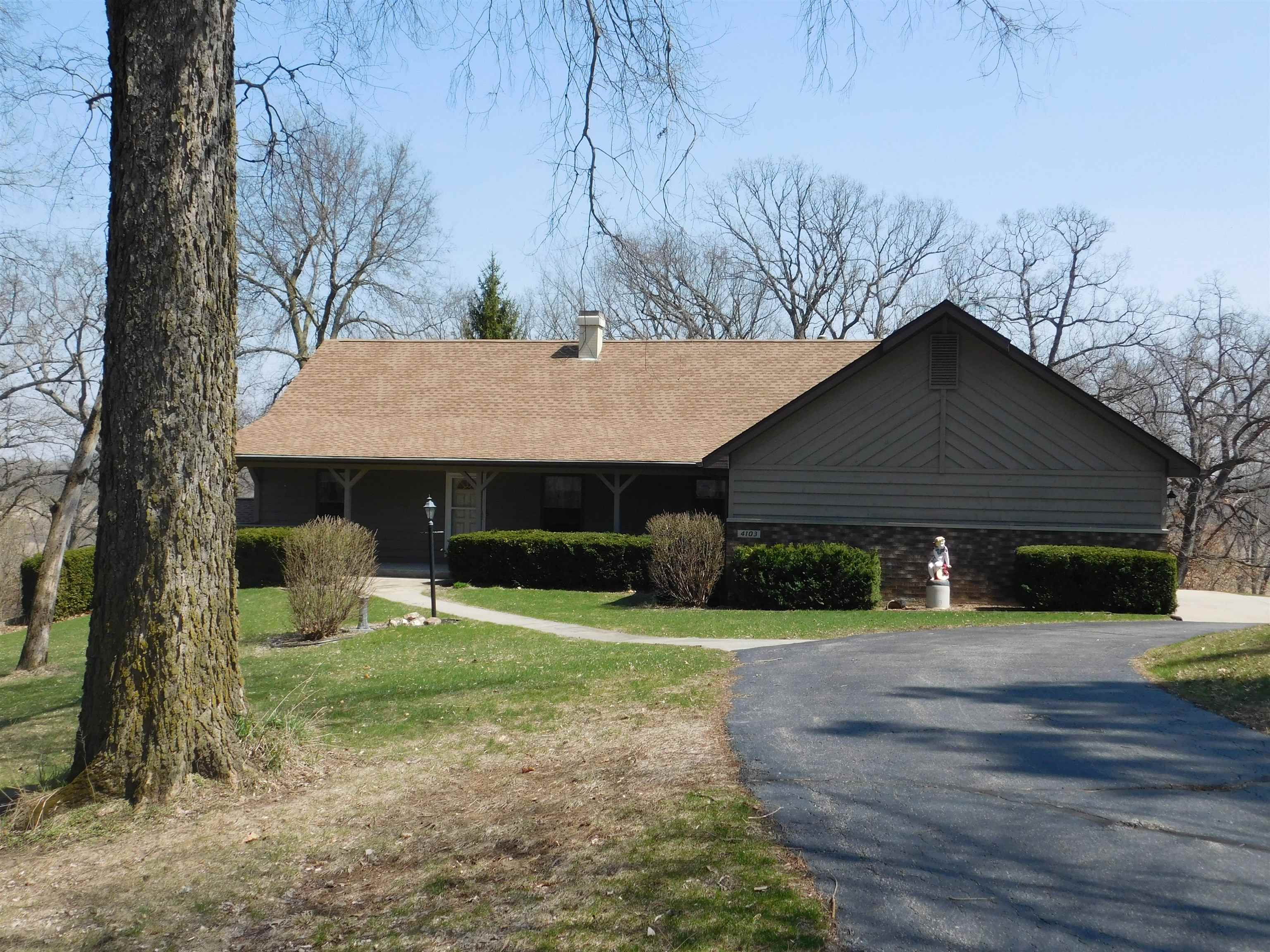 4103 North AYP Road Lena, IL 61048 - Photo 20 of 96 a front view of house with yard and trees in the background