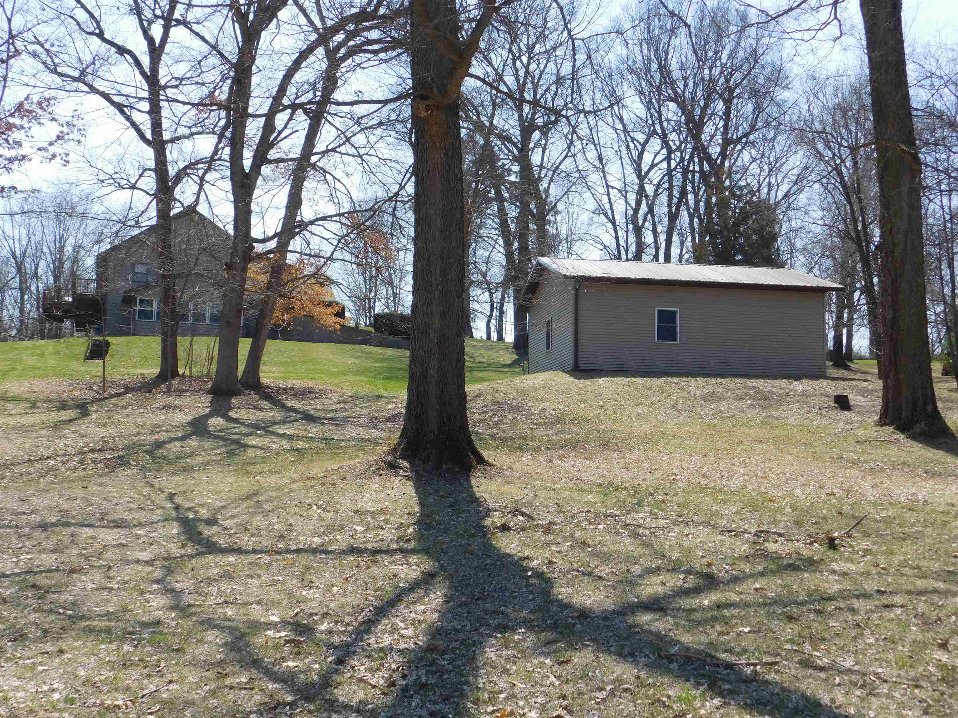 4103 North AYP Road Lena, IL 61048 - Photo 31 of 96 a backyard of a house with lots of green space