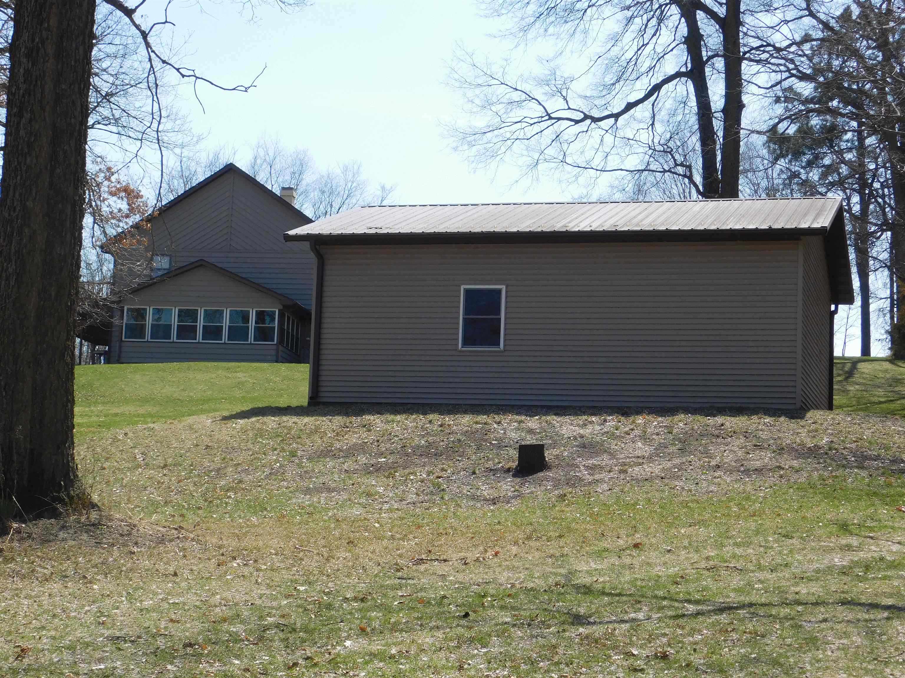 4103 North AYP Road Lena, IL 61048 - Photo 32 of 96 a house with a tree in the background