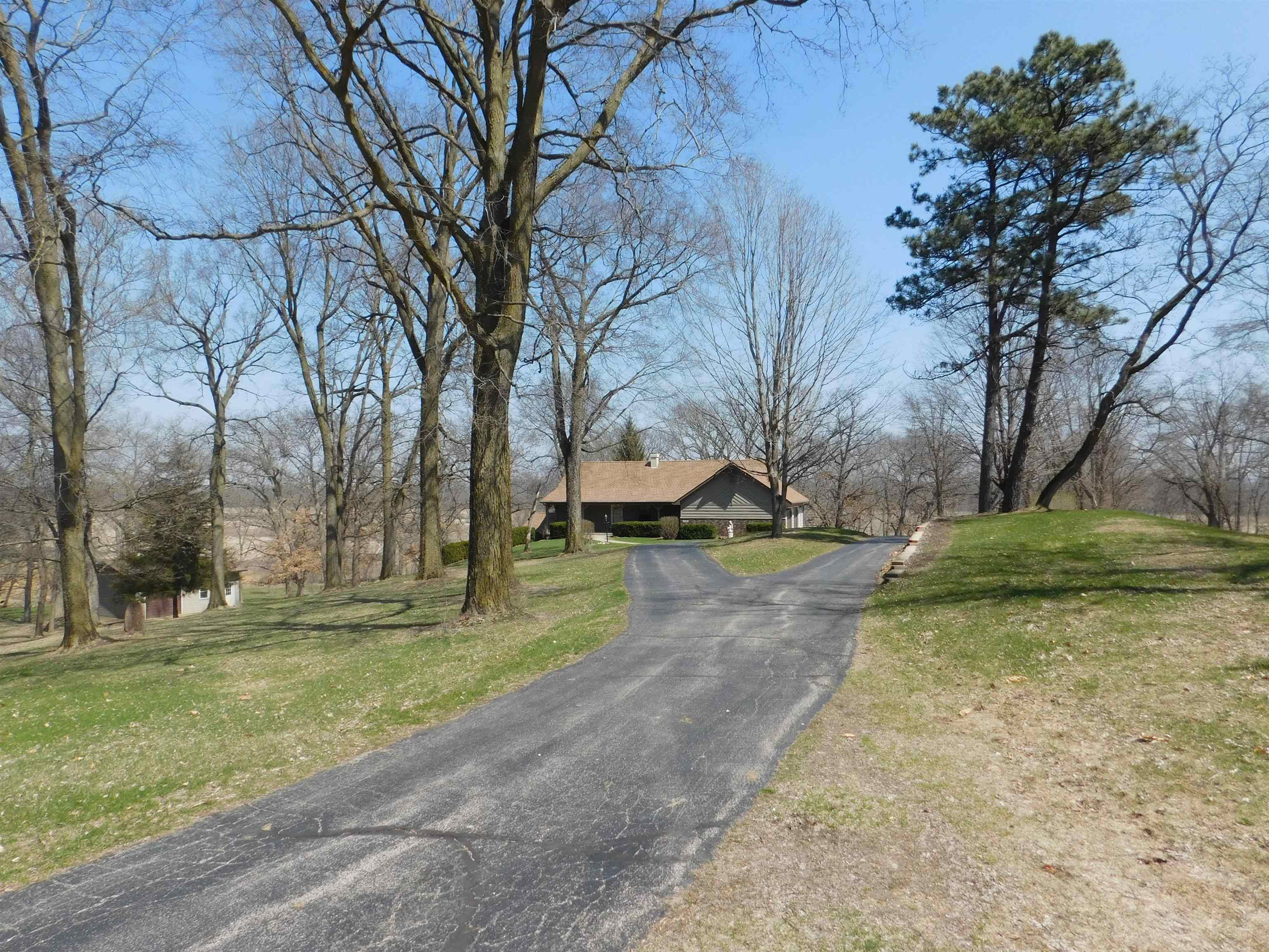 4103 North AYP Road Lena, IL 61048 - Photo 44 of 96 a view of a yard with plants and trees