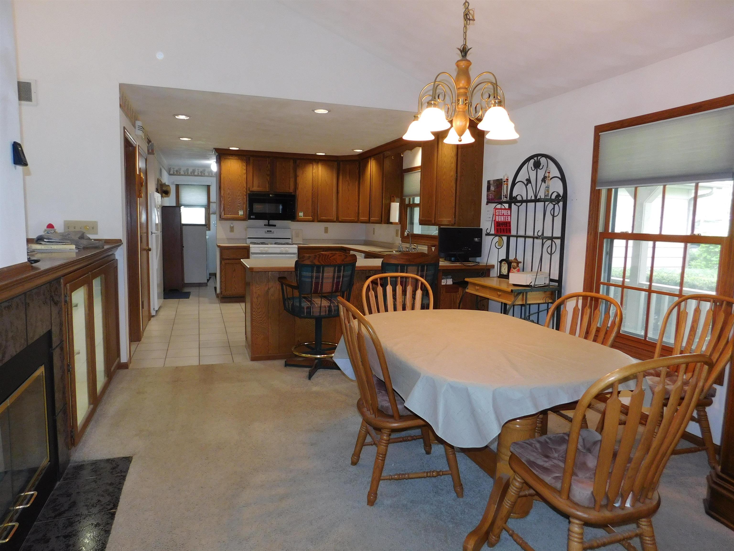 4103 North AYP Road Lena, IL 61048 - Photo 46 of 96 a view of a a dining room with furniture window and wooden floor