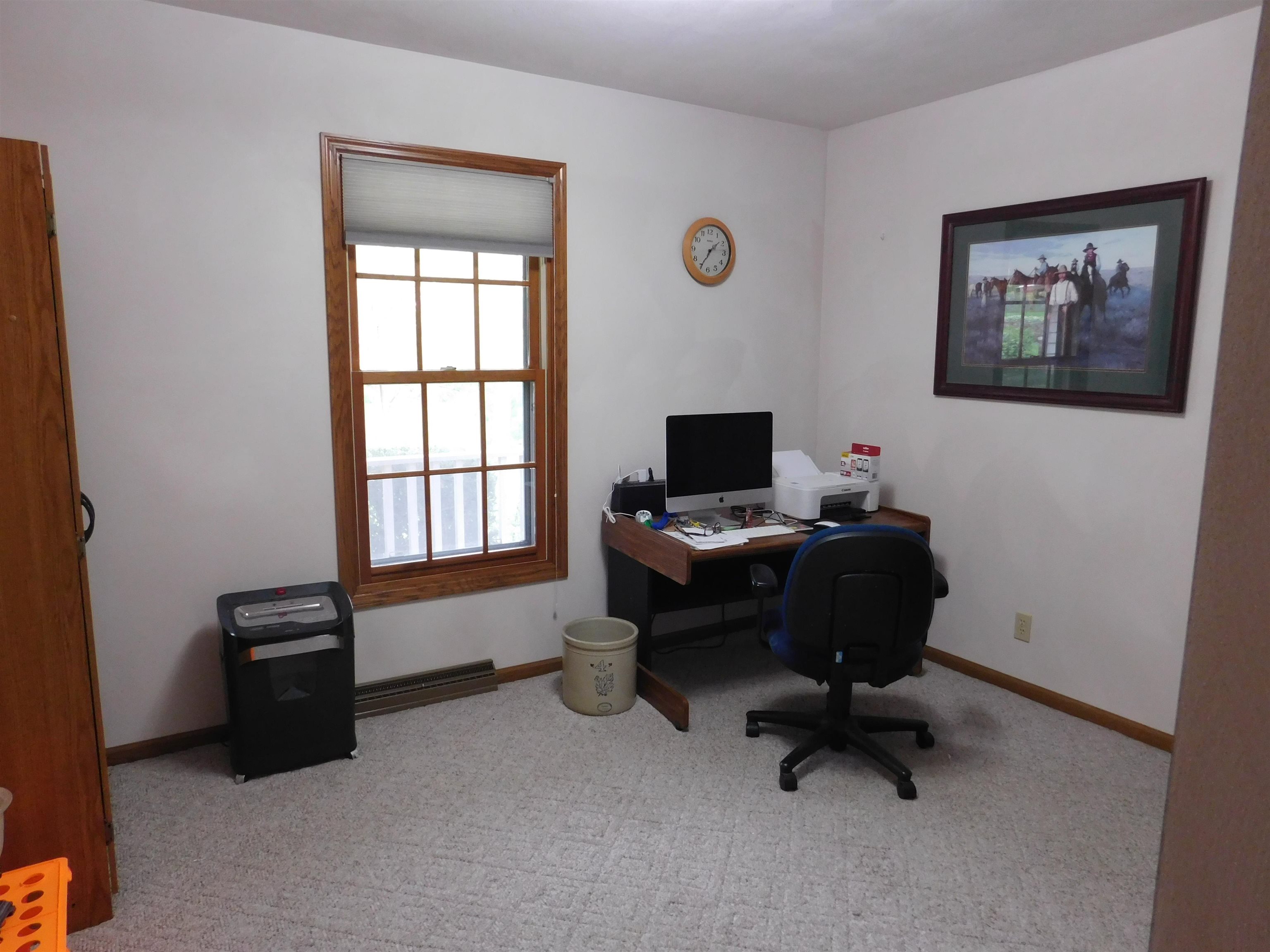 4103 North AYP Road Lena, IL 61048 - Photo 55 of 96 a view of a workspace with furniture and a window