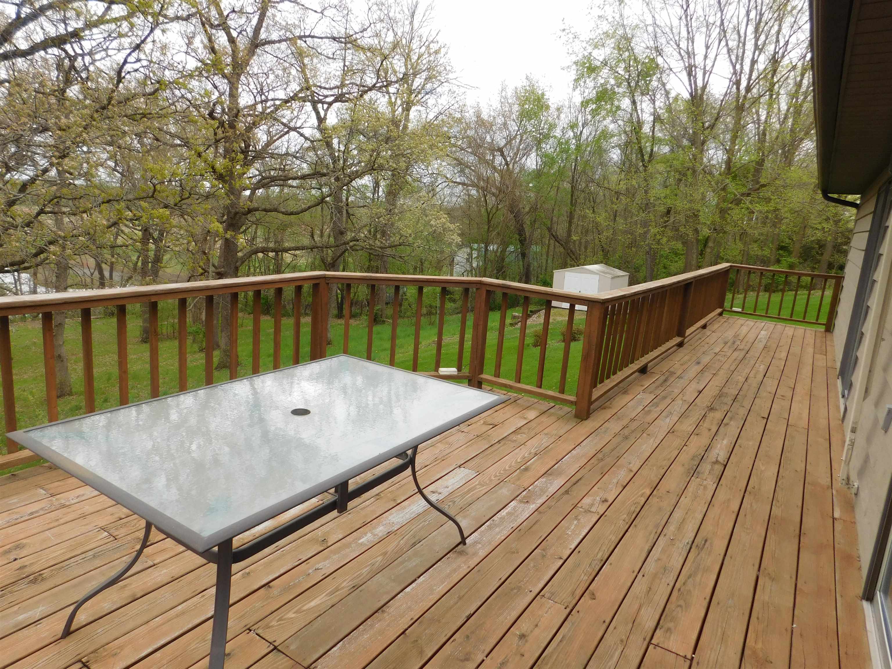 4103 North AYP Road Lena, IL 61048 - Photo 63 of 96 a view of balcony with wooden floor and outdoor seating