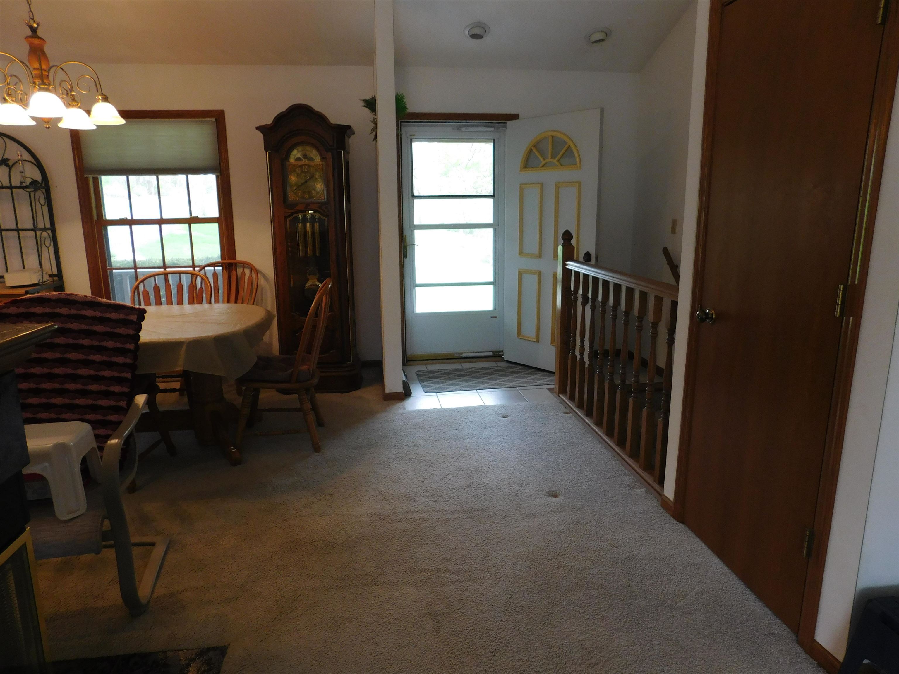 4103 North AYP Road Lena, IL 61048 - Photo 65 of 96 a view of a hallway with furniture and a window