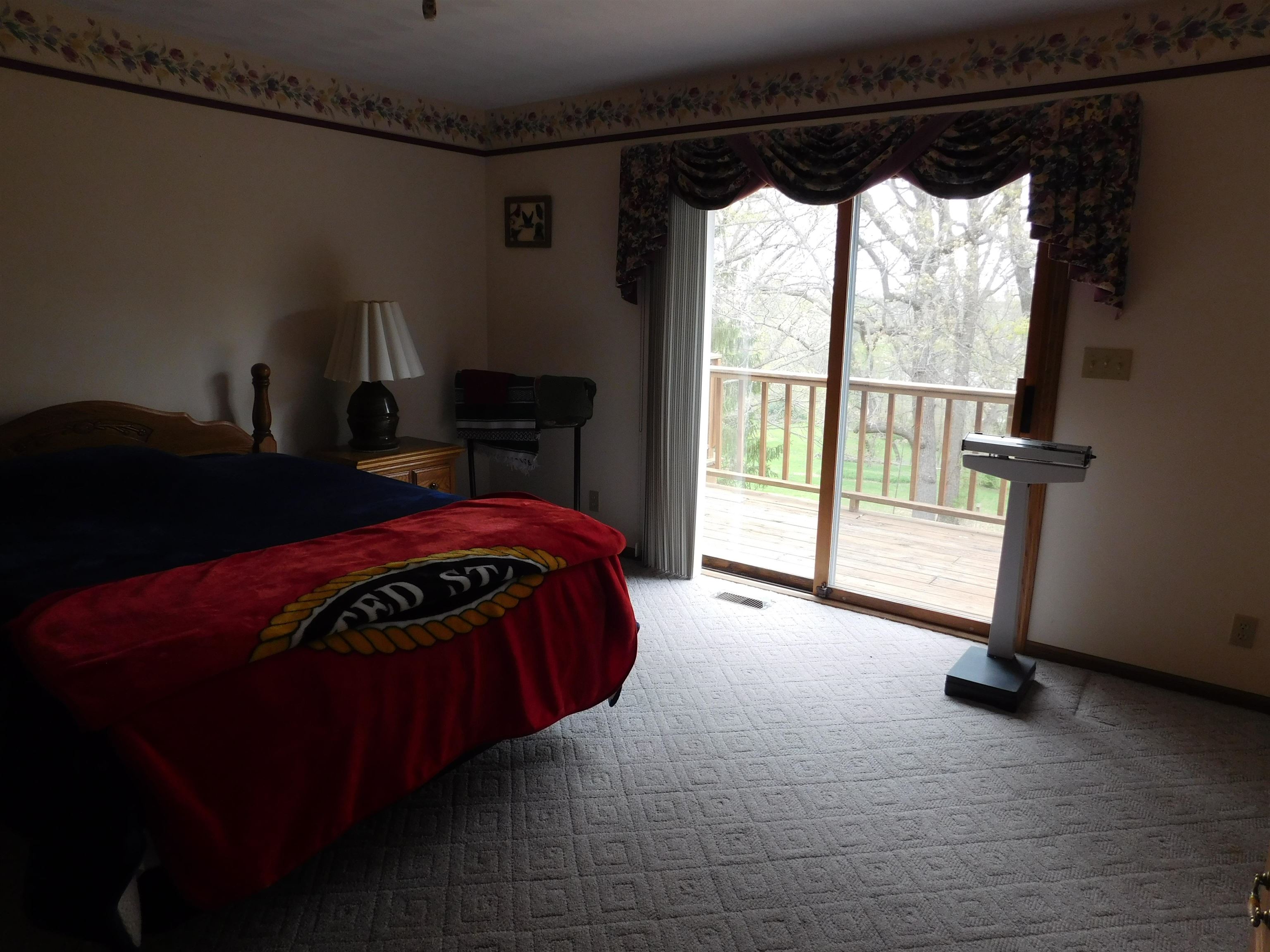 4103 North AYP Road Lena, IL 61048 - Photo 67 of 96 a bedroom with a bed and a window