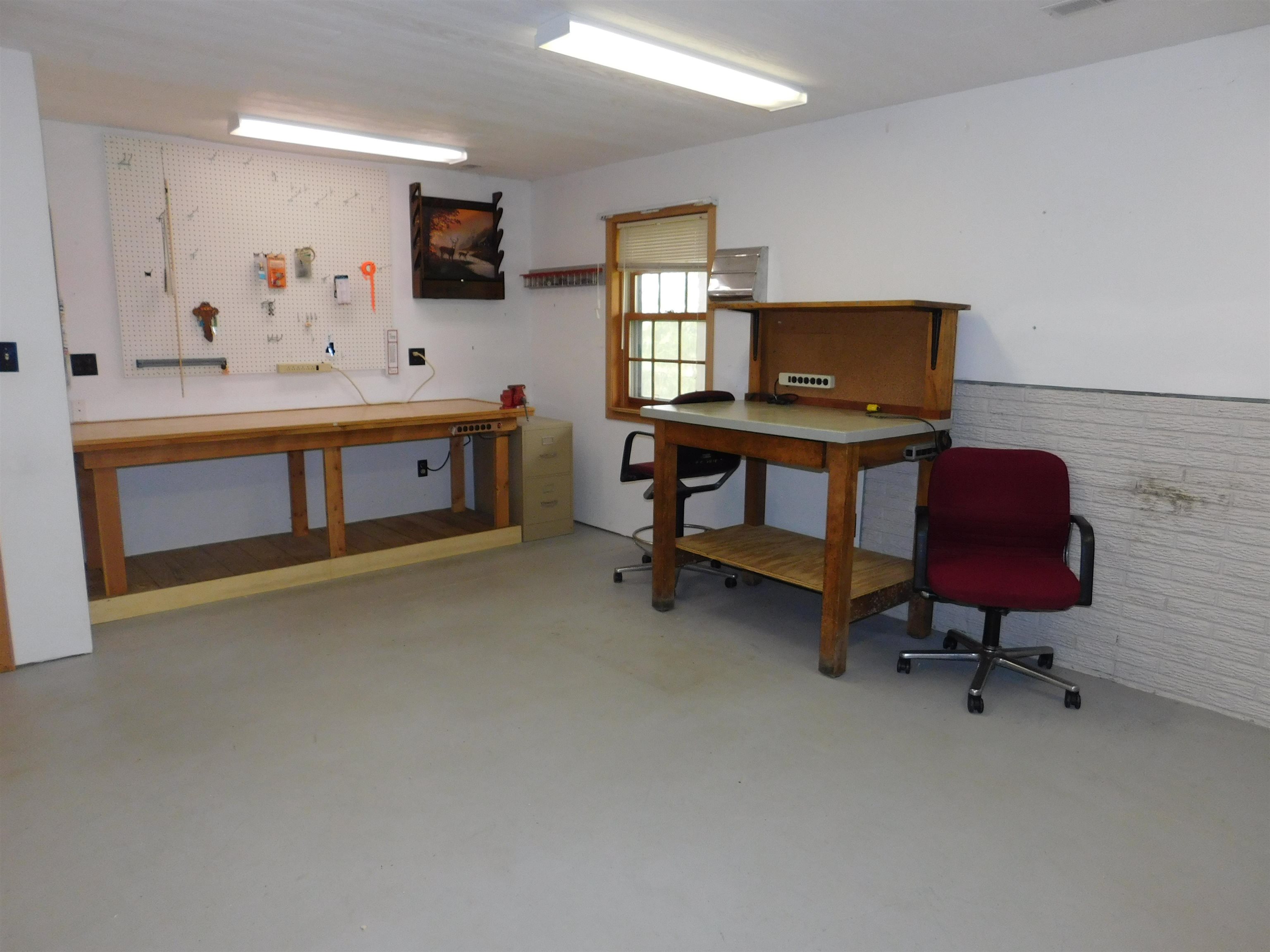 4103 North AYP Road Lena, IL 61048 - Photo 76 of 96 a living room with furniture and a flat screen tv