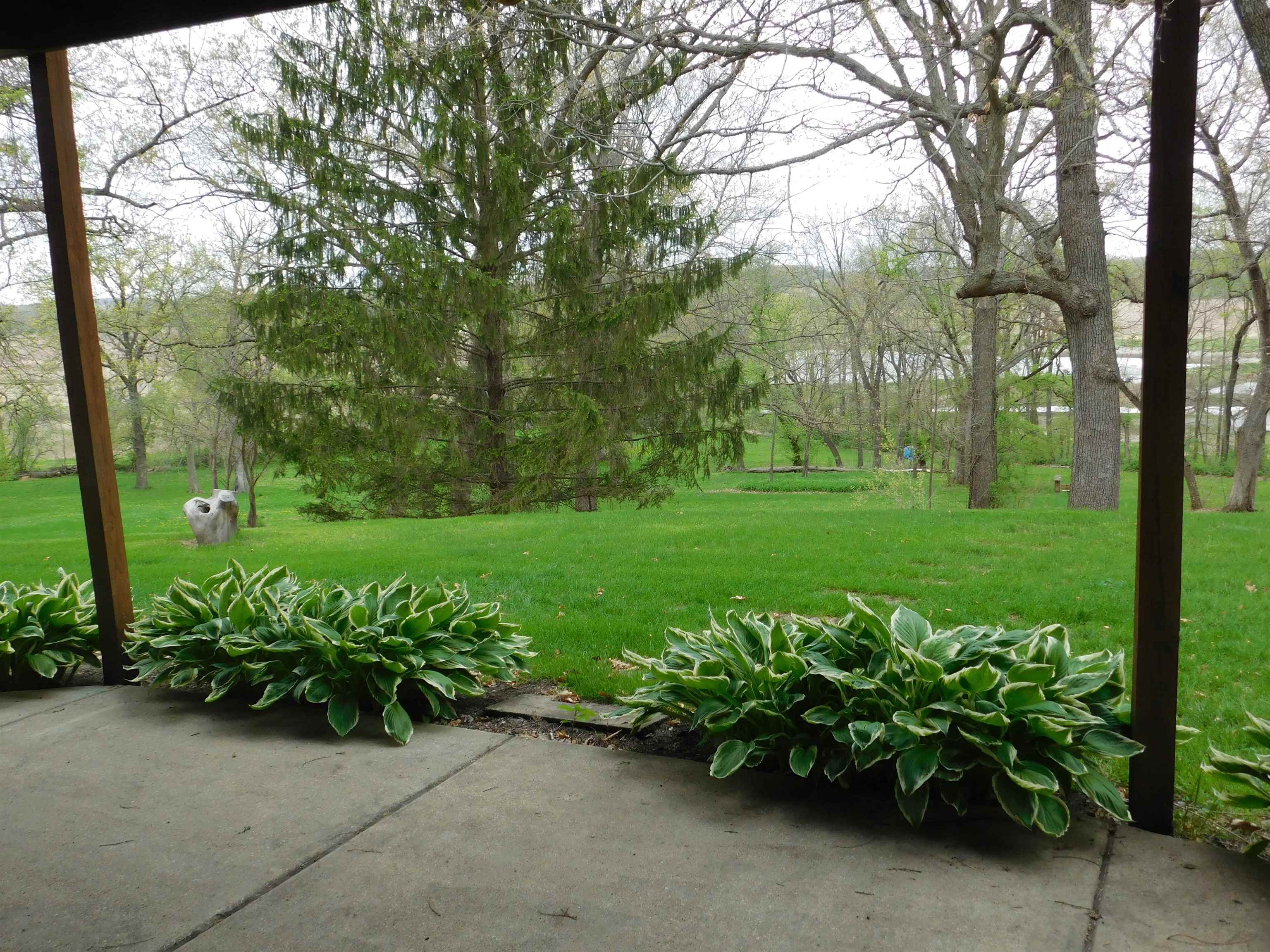 4103 North AYP Road Lena, IL 61048 - Photo 84 of 96 a garden with a bench in a garden